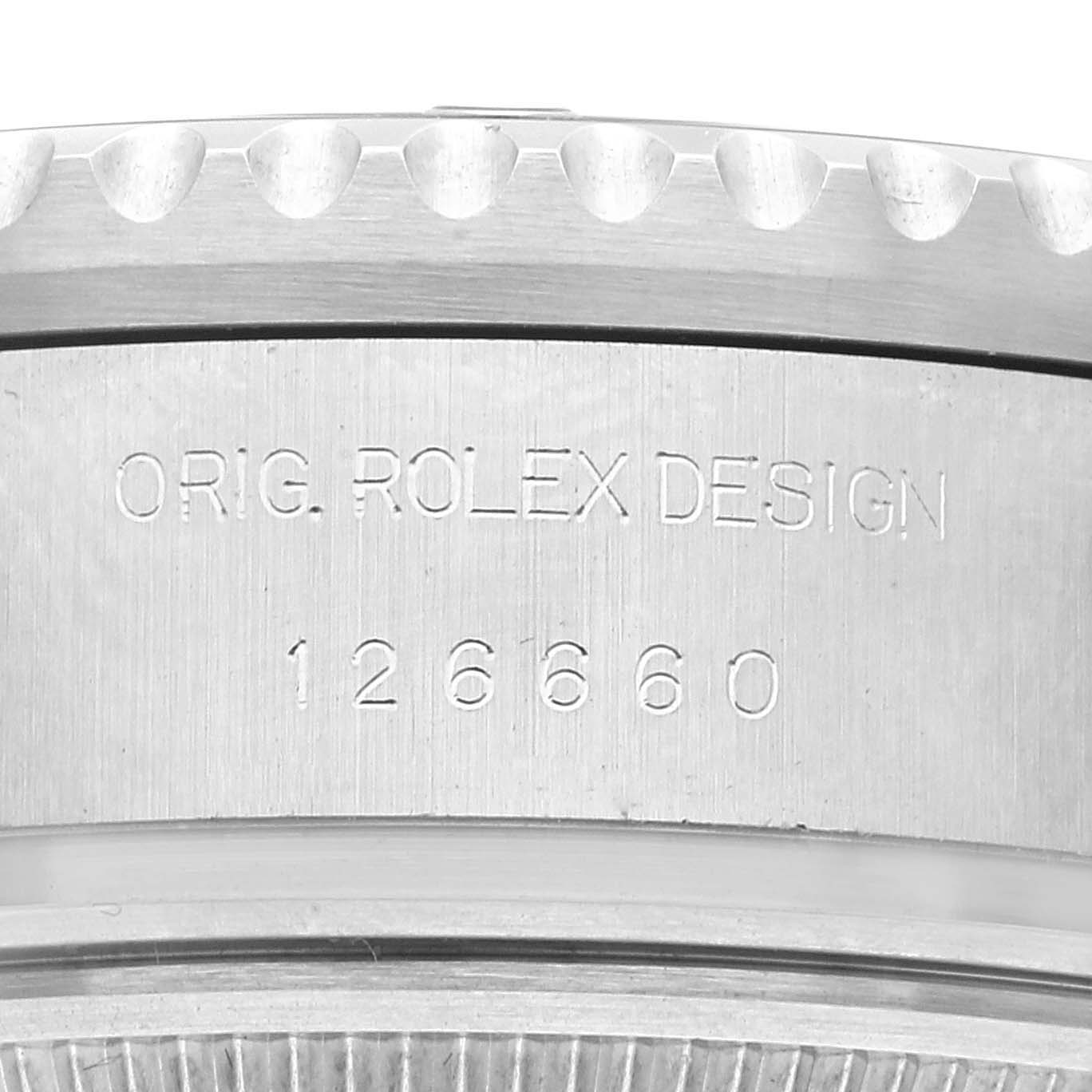 The image shows a close-up of the case back side of the Rolex Sea-Dweller 126660 Men's Stainless Steel Blue Dial 126660 Men's Stainless Steel Blue Dial model, highlighting the engraved model number "126660" and "ORIG. ROLEX DESIGN".