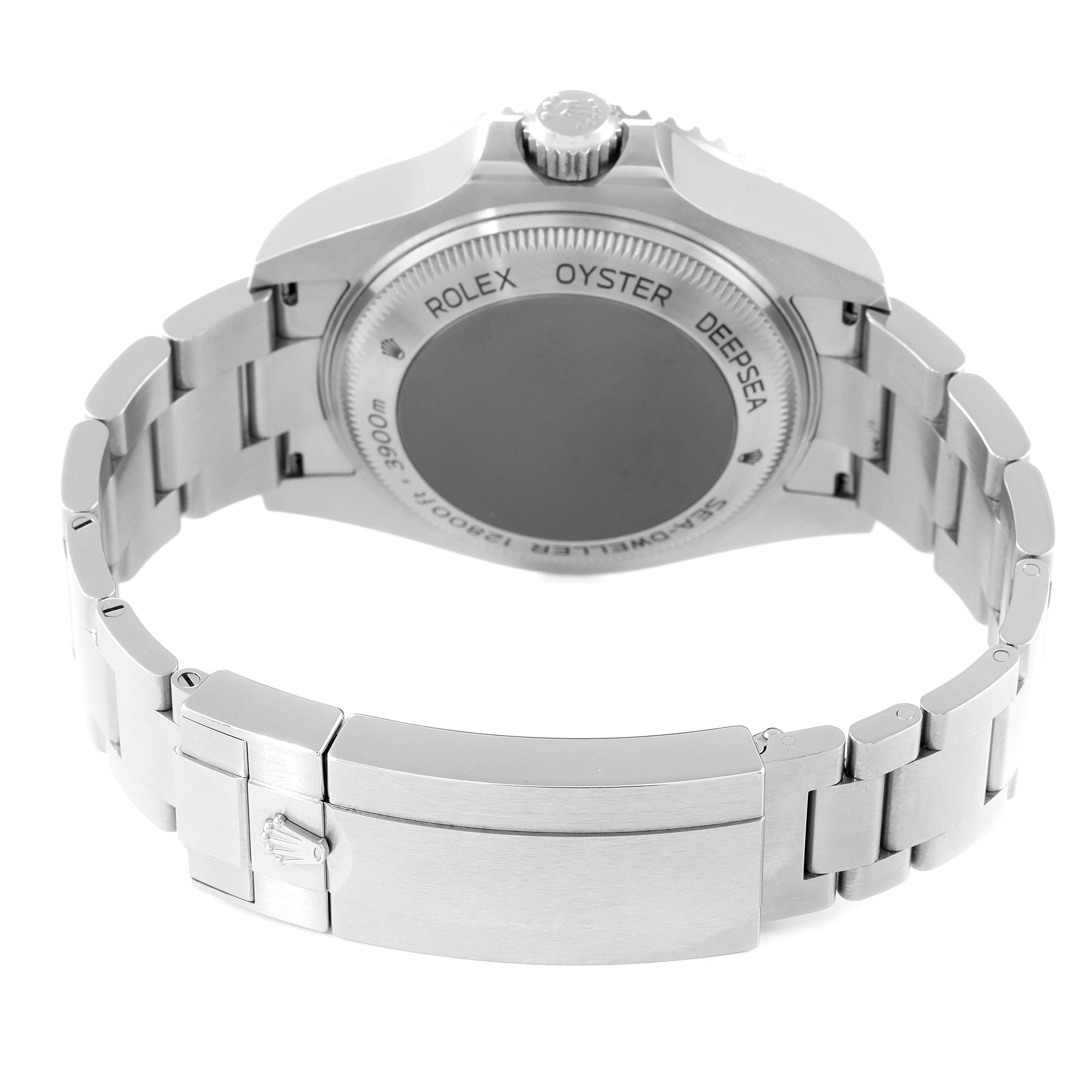 The image shows the back view of the Rolex Sea-Dweller 126660 Men
s Stainless Steel Blue Dial 126660 Men
s Stainless Steel Blue Dial watch, highlighting its case back, bracelet, and clasp.