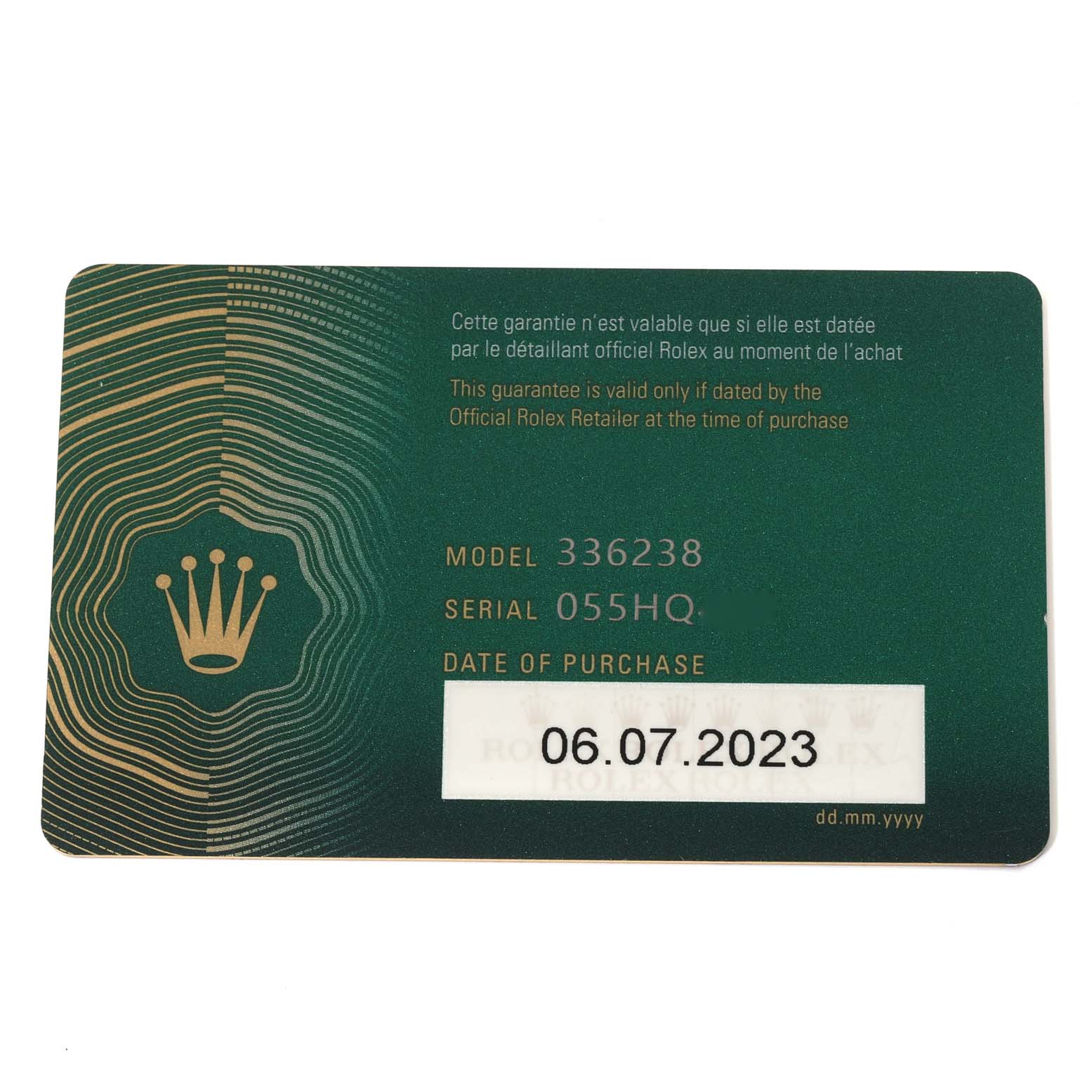 The image shows a green authorized warranty card with model, serial number details, and purchase date for a Rolex Sky-Dweller 336238 Men's Yellow Gold Black Dial 336238 Men's Yellow Gold Black Dial.