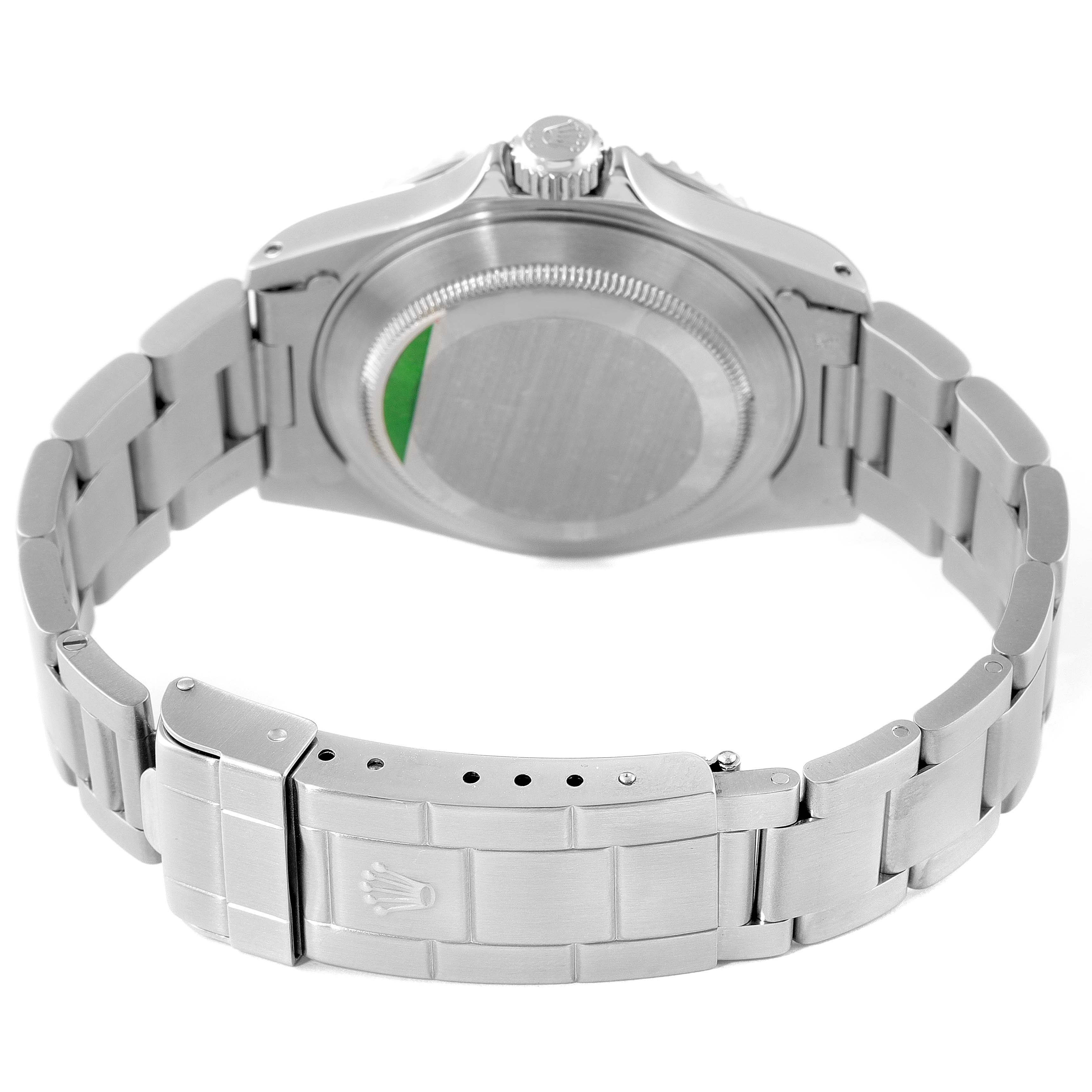 The image shows the back, clasp, and bracelet of a Rolex Submariner 14060 Men
s Stainless Steel Black Dial 14060 Men
s Stainless Steel Black Dial watch from a slightly elevated rear angle.