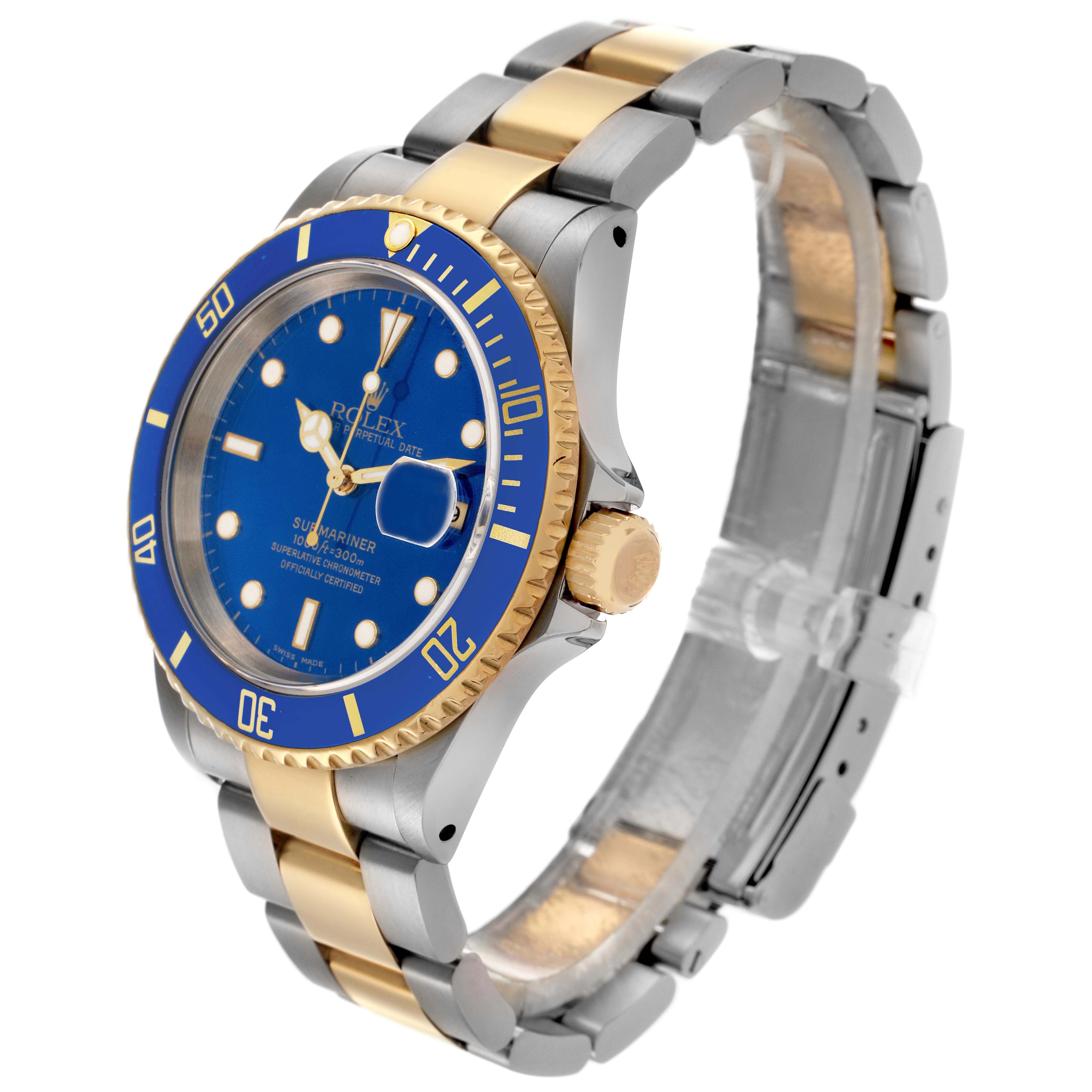 The Rolex Submariner 16613 Men's Steel and Gold (two tone) Blue Dial 16613 Men's Steel and Gold (two tone) Blue Dial is shown at a 3/4 angle, displaying the dial, bezel, crown, and bracelet.