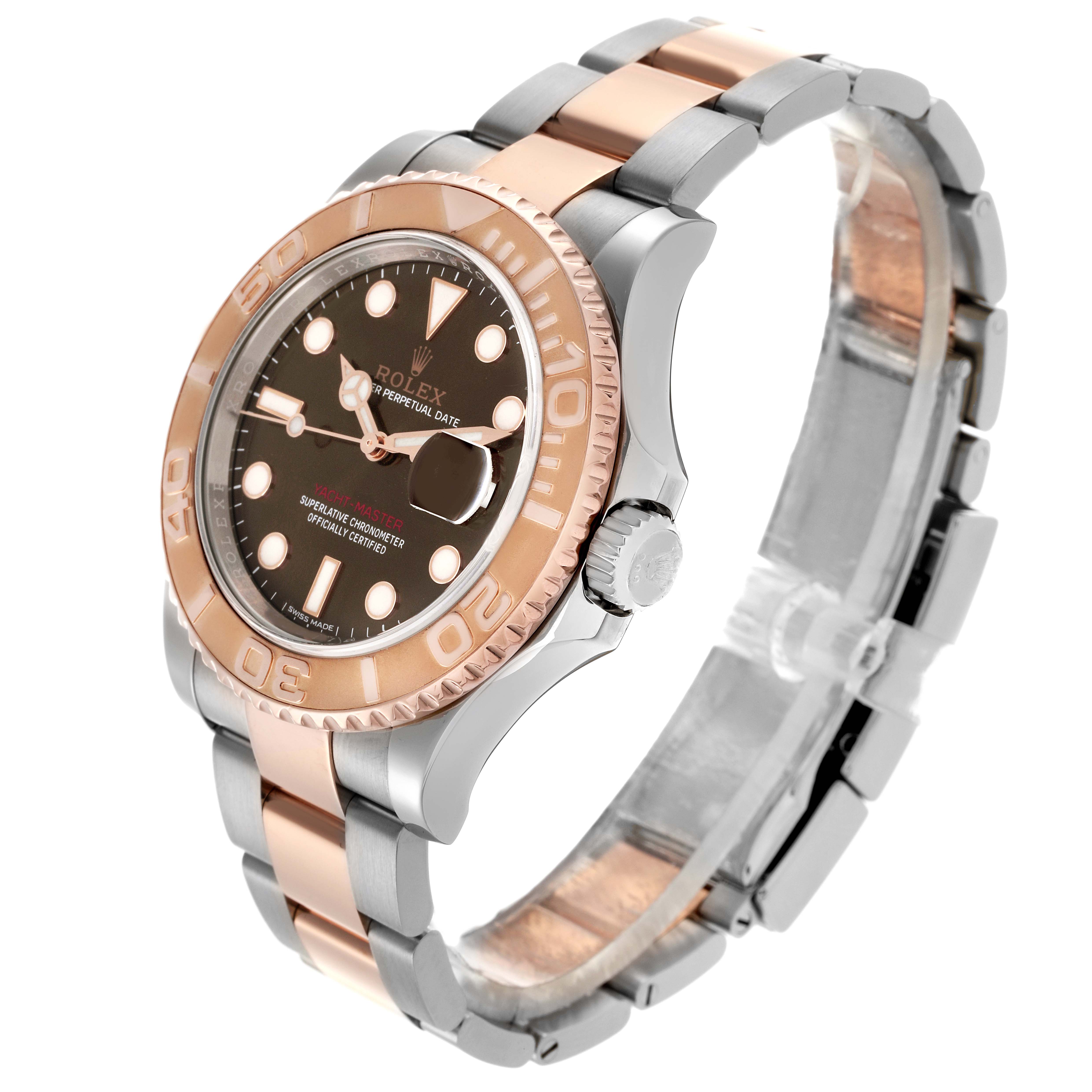 The Rolex Turn-o-Graph is shown at a three-quarter angle, highlighting the bezel, dial, and two-tone bracelet.