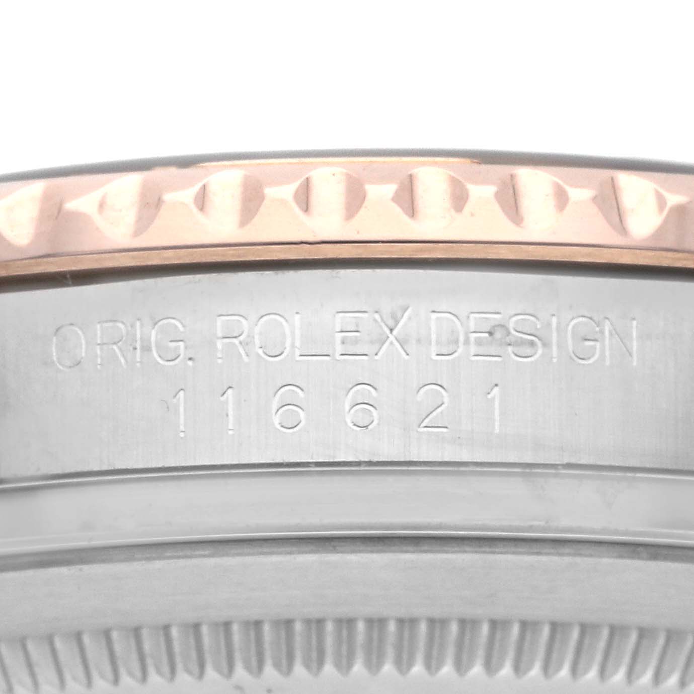 The image shows a close-up of the bezel and case side of a Rolex Turn-o-Graph, highlighting the engraving.