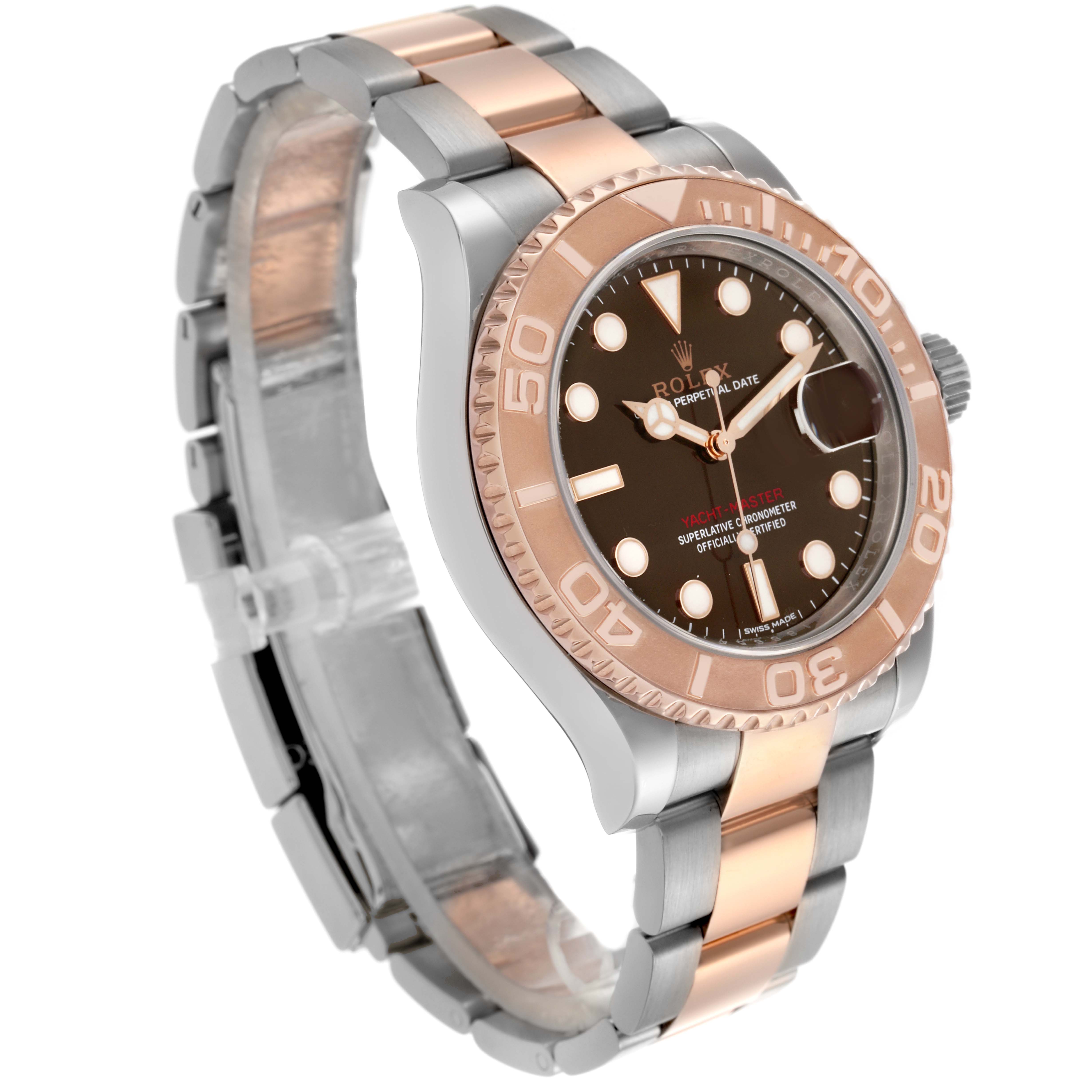 The Rolex Turn-o-Graph watch is shown at a three-quarter angle, highlighting the dial, bezel, and two-tone bracelet.