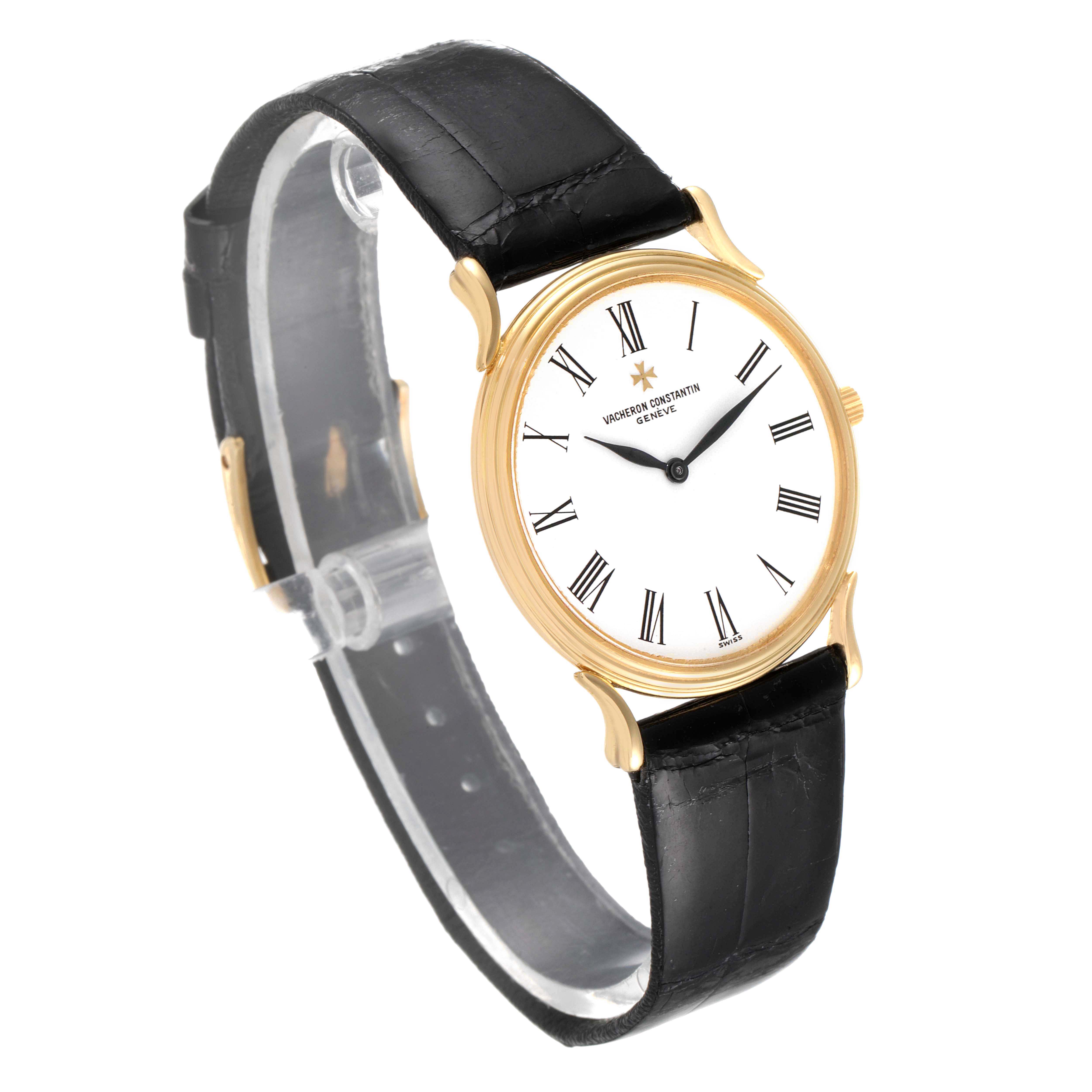 This image shows a Vacheron Constantin Vintage 33216 Men's Yellow Gold White Dial 33216 Men's Yellow Gold White Dial model watch at an angled side view, highlighting the black strap and gold case with Roman numerals.