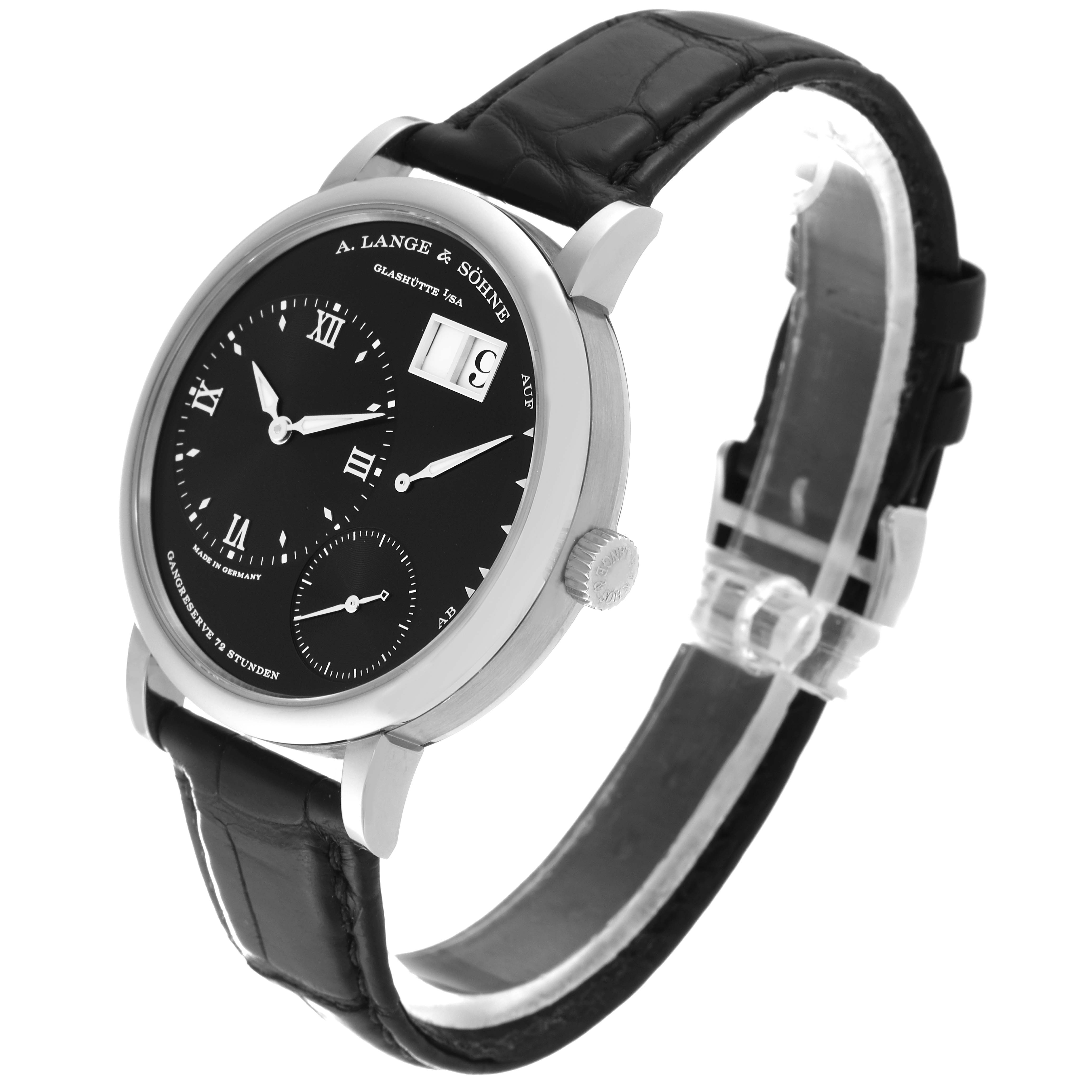 The image shows a side angle of the Lange 1 model by A. Lange & Söhne, highlighting the black dial, case, crown, and black leather strap.