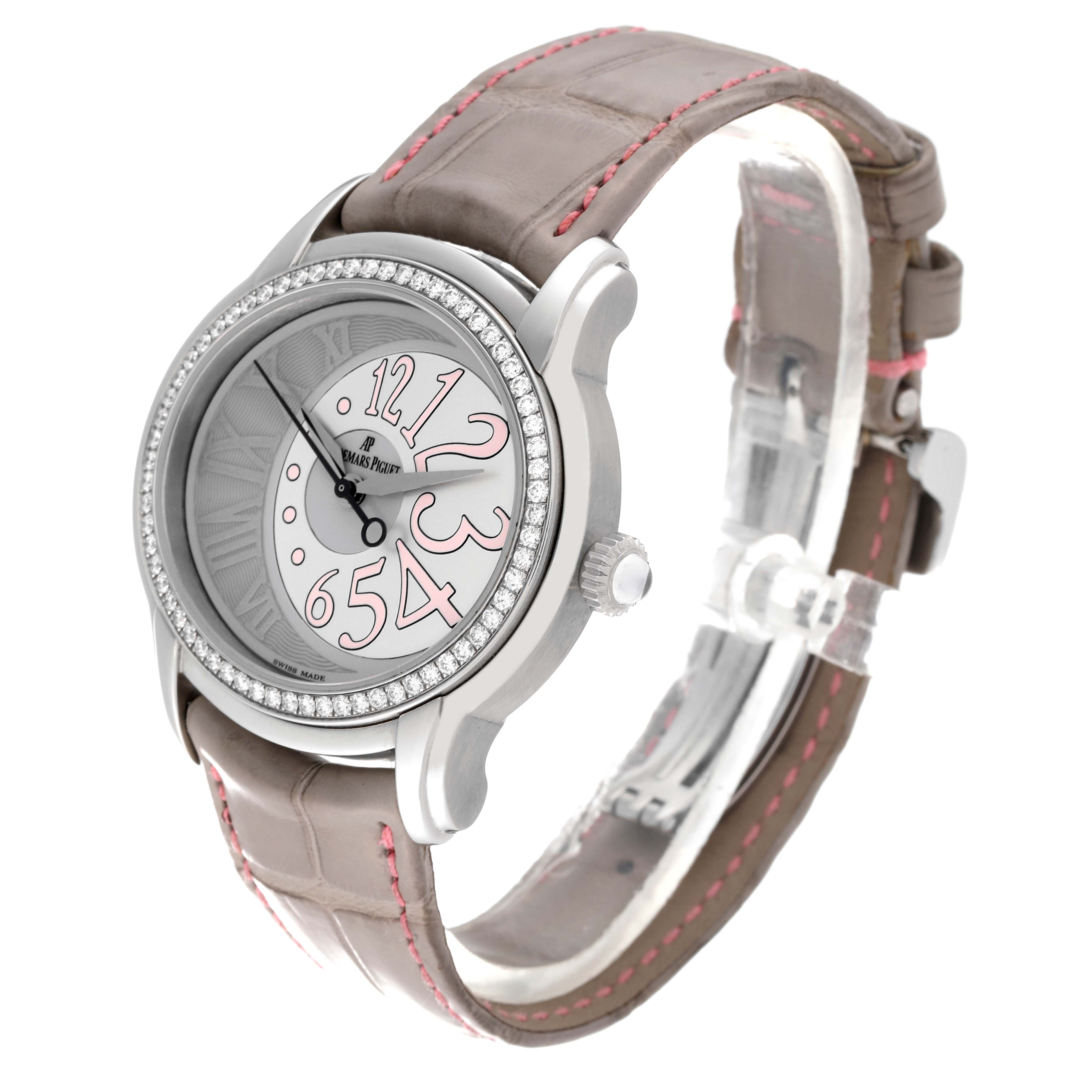 The image shows an Audemars Piguet Millenary 77301ST.ZZ.D009CR.01 Women's Stainless Steel Silver Dial 77301ST.ZZ.D009CR.01 Women's Stainless Steel Silver Dial watch shot from a slight side angle, displaying its face, strap, bezel, and crown.