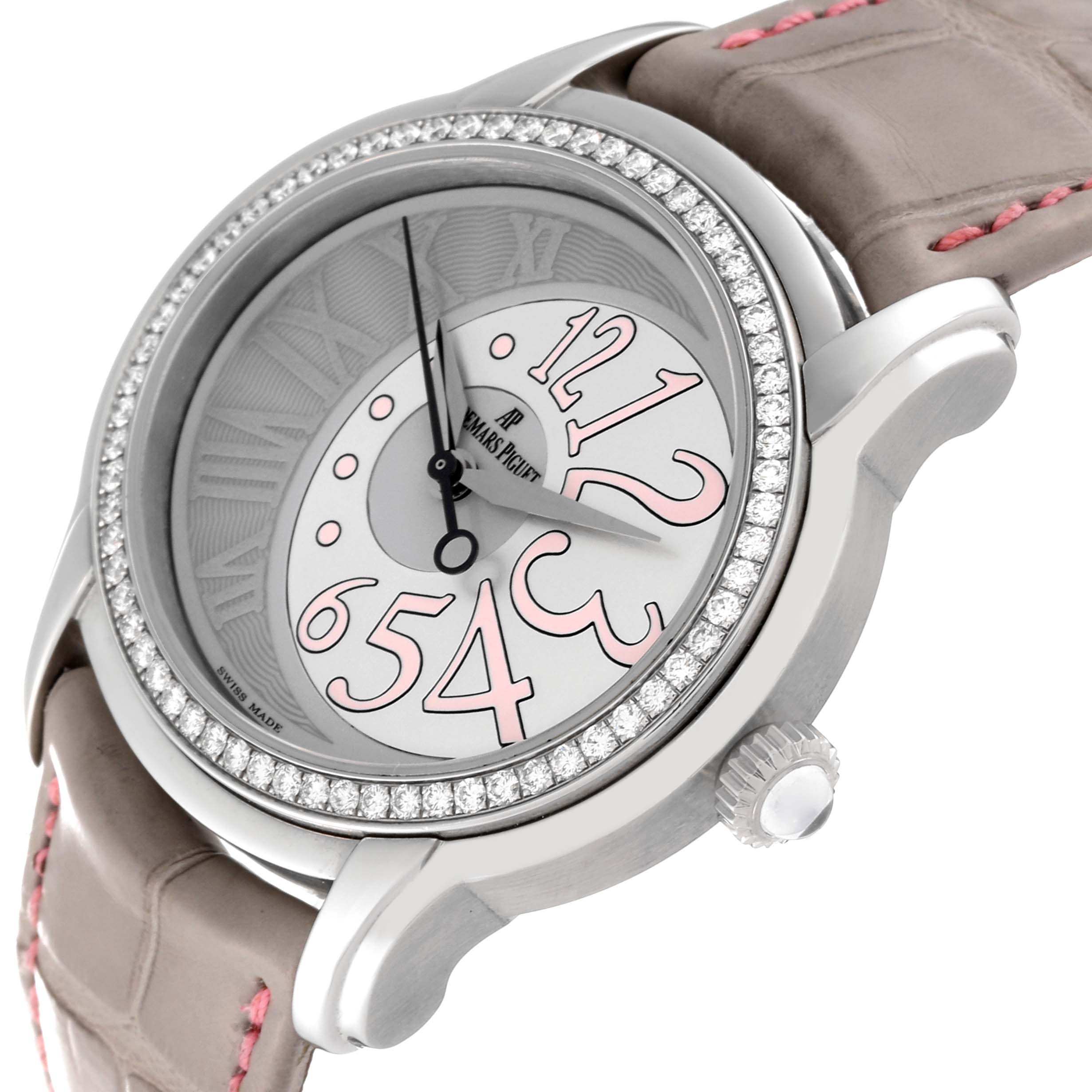 This image shows an Audemars Piguet Millenary 77301ST.ZZ.D009CR.01 Women's Stainless Steel Silver Dial 77301ST.ZZ.D009CR.01 Women's Stainless Steel Silver Dial watch at an angled view, highlighting the dial, bezel with diamonds, crown, and part of the strap.