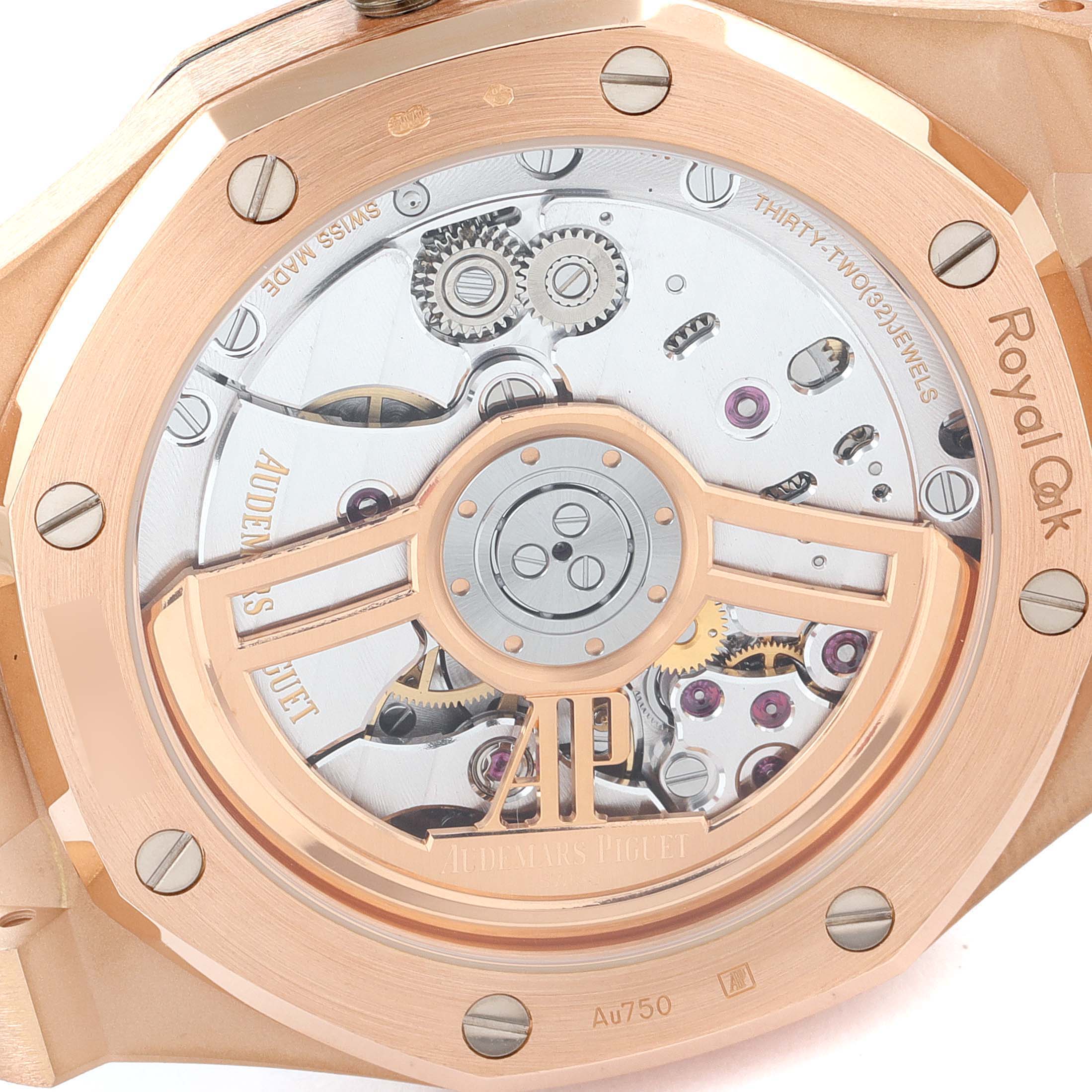 The image shows the back view of an Audemars Piguet Royal Oak 15500OR.OO.D002CR.01 Men's Rose Gold Black Dial 15500OR.OO.D002CR.01 Men's Rose Gold Black Dial model, showcasing its exposed mechanical movement.