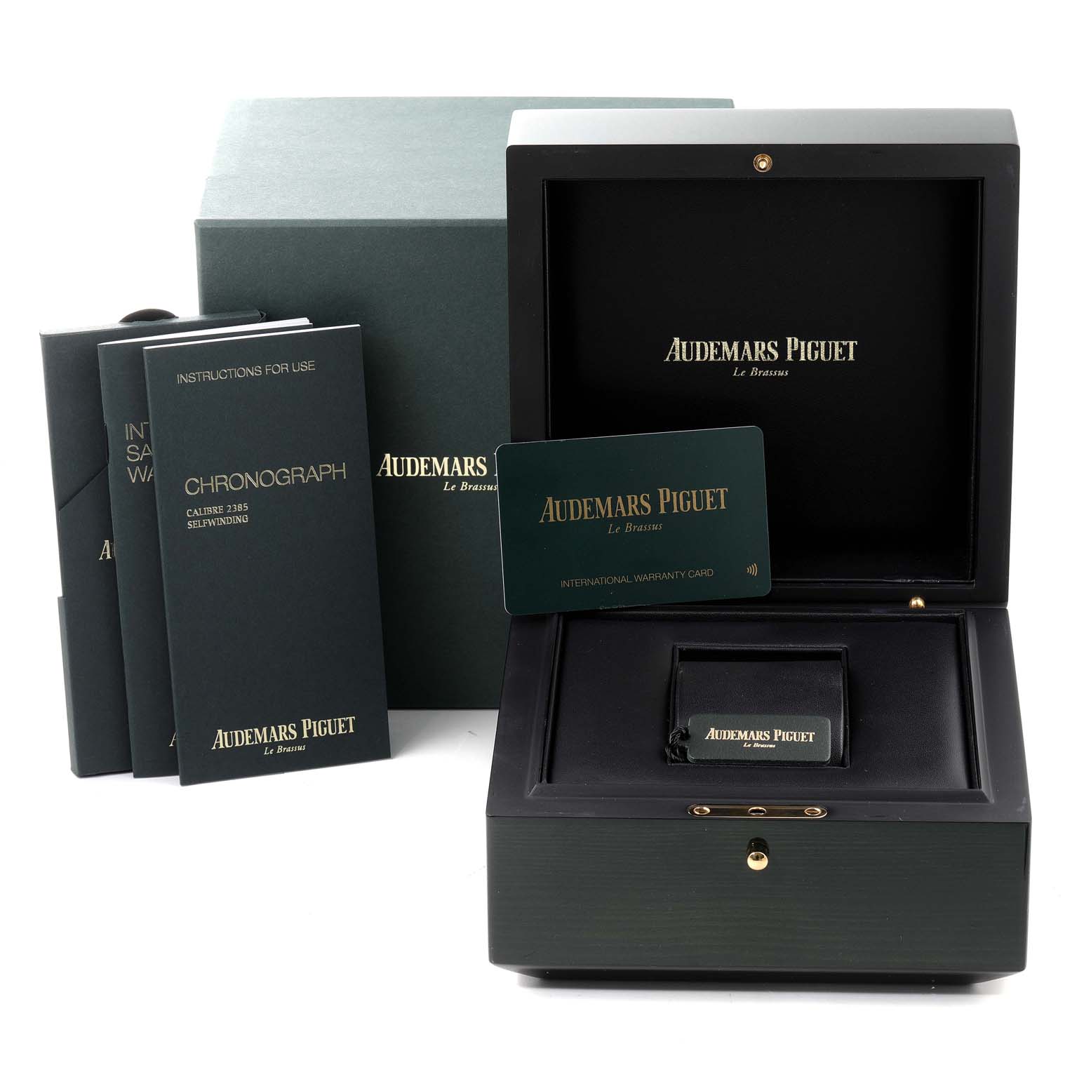 The image shows the packaging, instruction booklets, and warranty card for the Audemars Piguet Royal Oak 15500OR.OO.D002CR.01 Men's Rose Gold Black Dial 15500OR.OO.D002CR.01 Men's Rose Gold Black Dial watch.