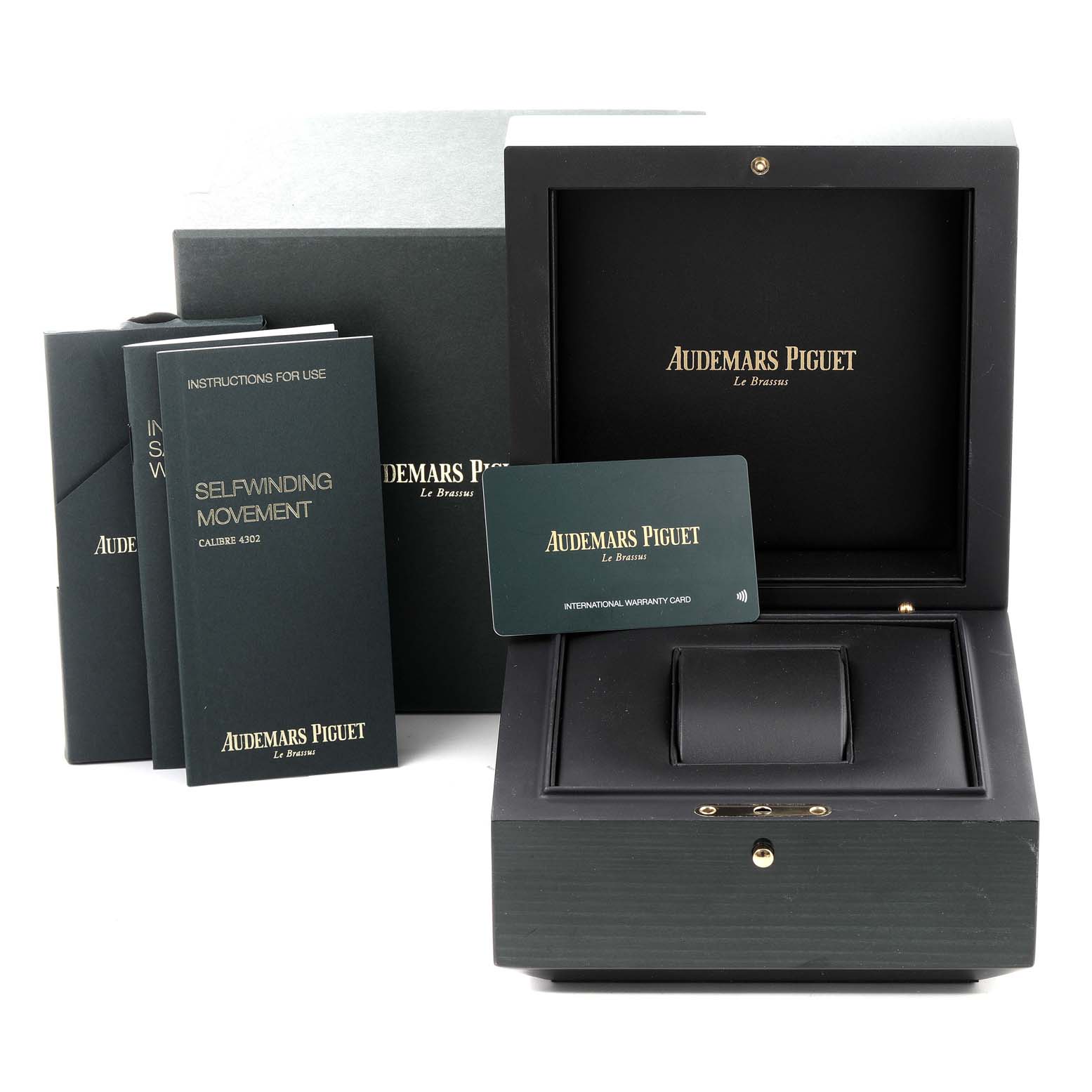 This image shows the packaging, manual booklets, and warranty card for the Audemars Piguet Royal Oak 26315ST.OO.1256ST.01 Men's Stainless Steel Silver Dial 26315ST.OO.1256ST.01 Men's Stainless Steel Silver Dial watch.