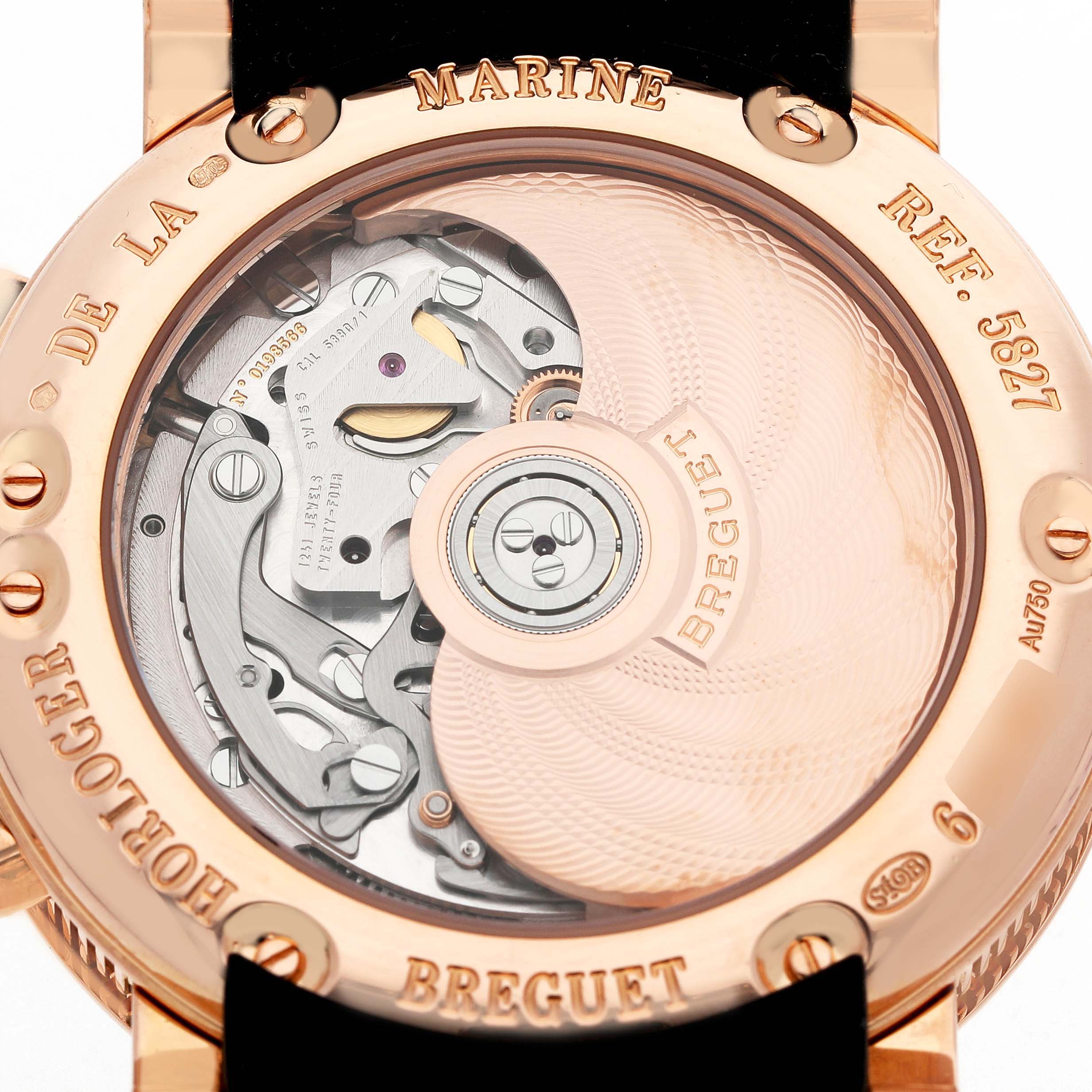 The image shows the back view of a Breguet Marine 5827BR/Z2/5ZU Men's Yellow Gold Silver Dial watch, displaying its intricate movement and rotor through a transparent case back.
