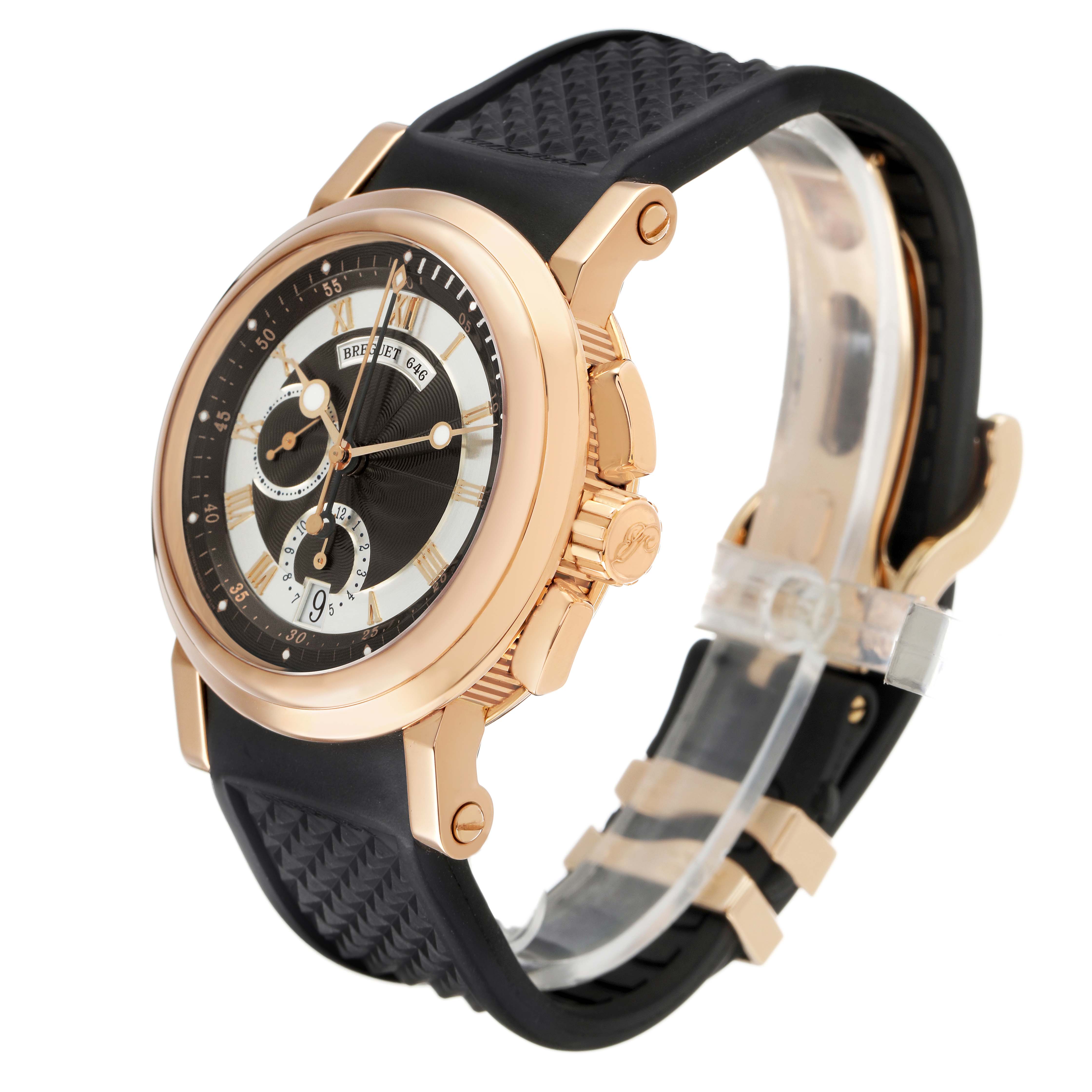 The Breguet Marine 5827BR/Z2/5ZU Men's Yellow Gold Silver Dial watch is shown at a three-quarter angle, highlighting the rose gold case, black dial, sub-dials, and black strap.