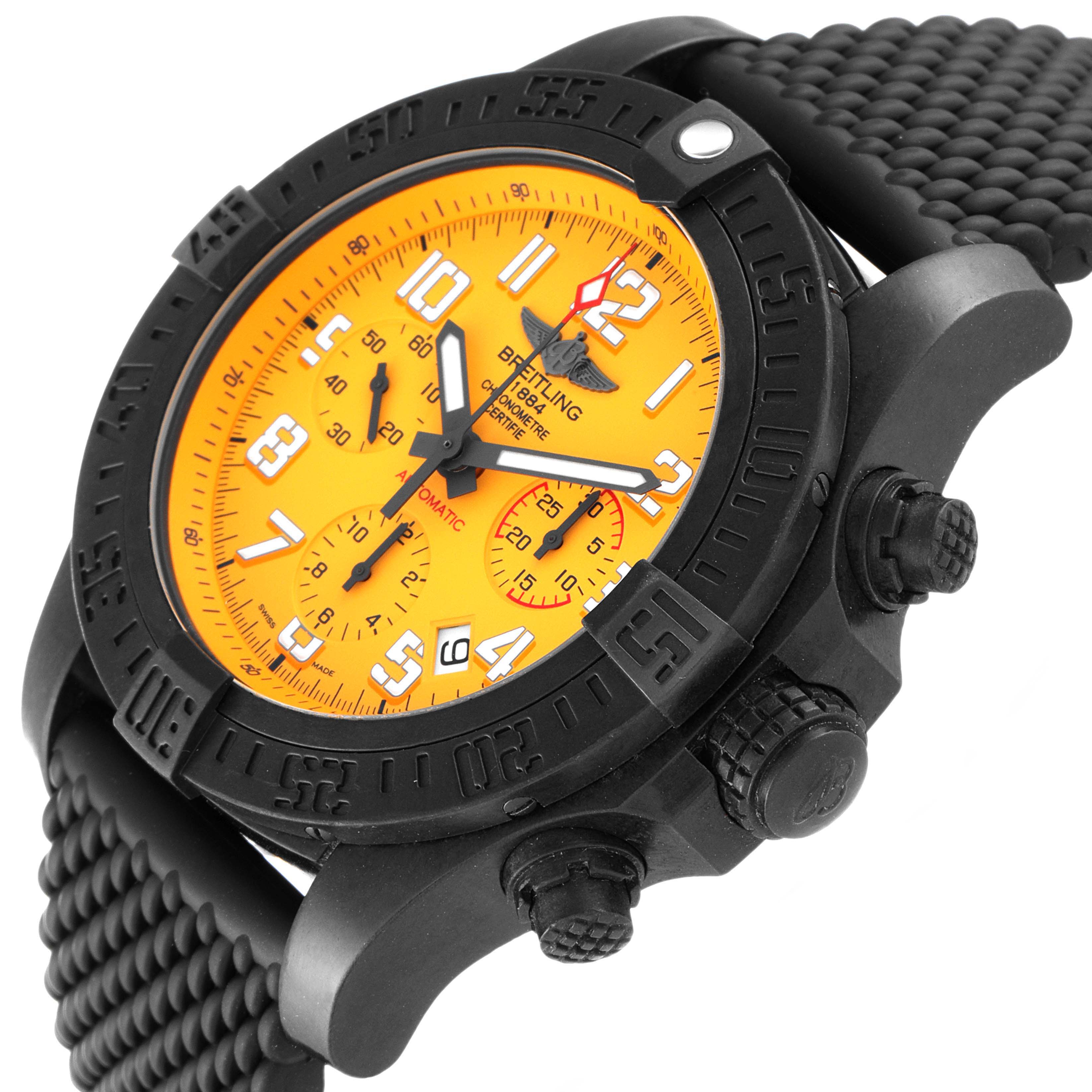 The image shows the Breitling Avenger XB0180E41I1W1 Men's Ceramic Yellow Dial XB0180E41I1W1 Men's Ceramic Yellow Dial watch at an angled close-up view, highlighting its yellow dial, black bezel, and rugged strap.