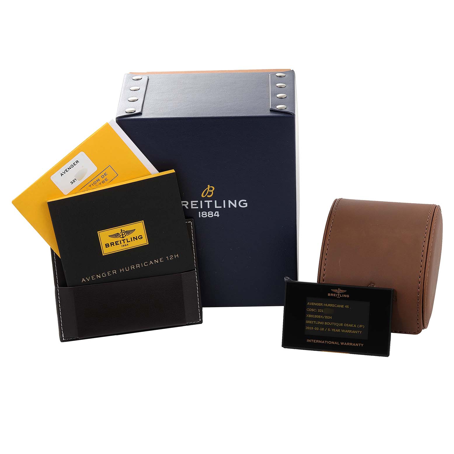 The image shows the packaging, warranty card, manual, and leather travel case for a Breitling Avenger XB0180E41I1W1 Men's Ceramic Yellow Dial XB0180E41I1W1 Men's Ceramic Yellow Dial watch.
