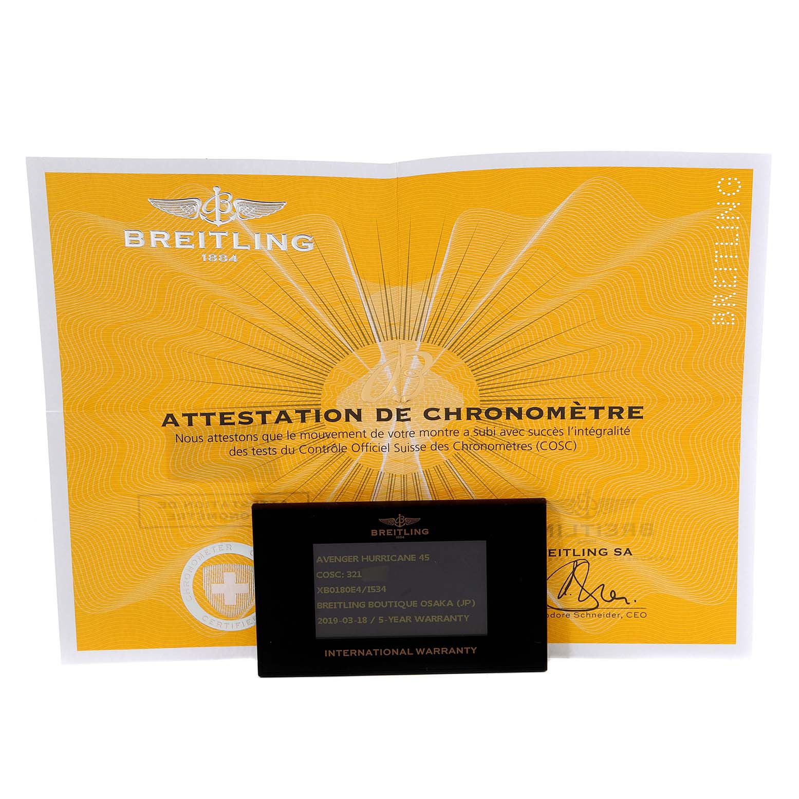 The image shows a Breitling Avenger XB0180E41I1W1 Men's Ceramic Yellow Dial XB0180E41I1W1 Men's Ceramic Yellow Dial watch warranty card and the chronometer certification document.
