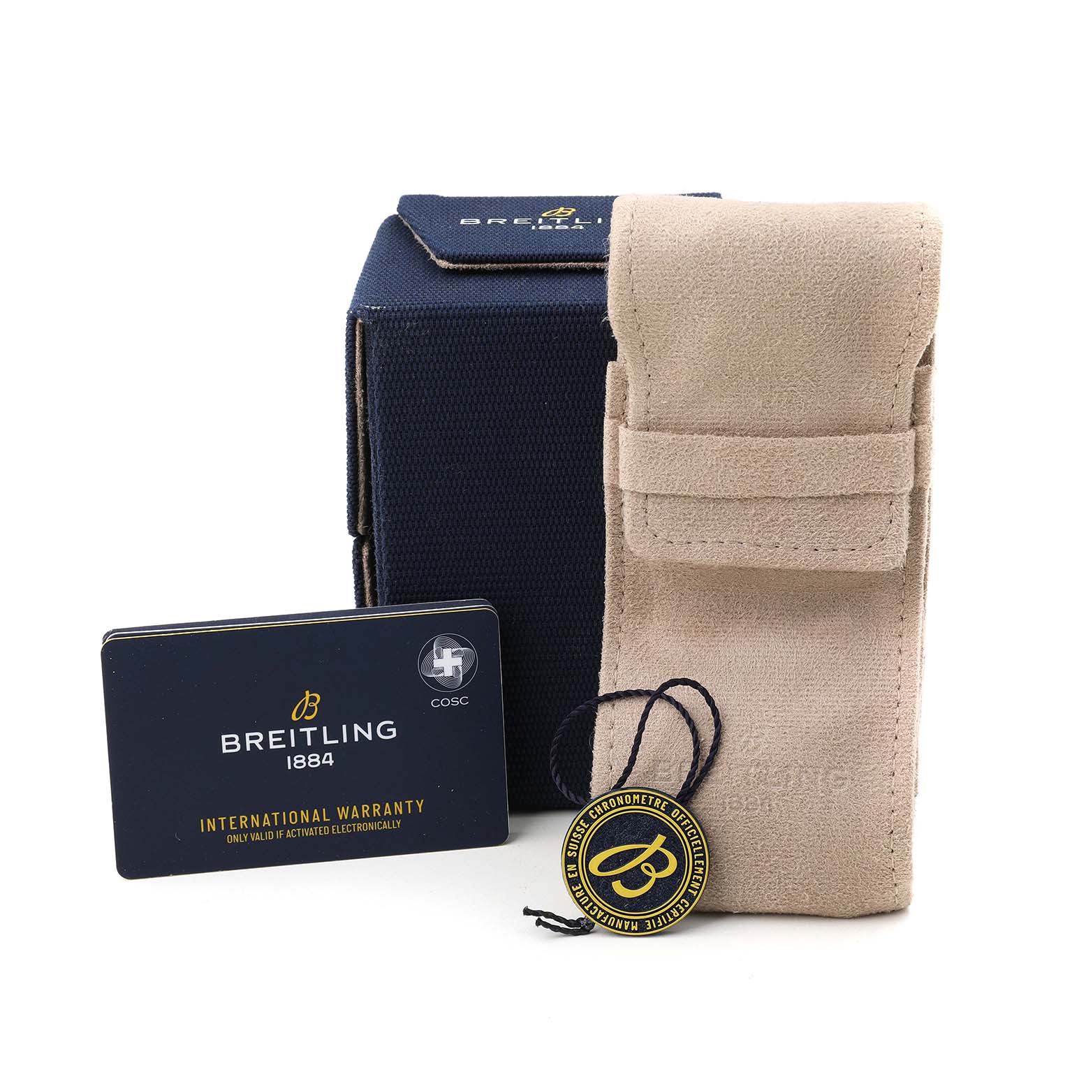 The image shows a Breitling Premier AB0145 Men's Stainless Steel Silver Dial watch box, a beige pouch, a warranty card, and a tag with the Breitling logo.