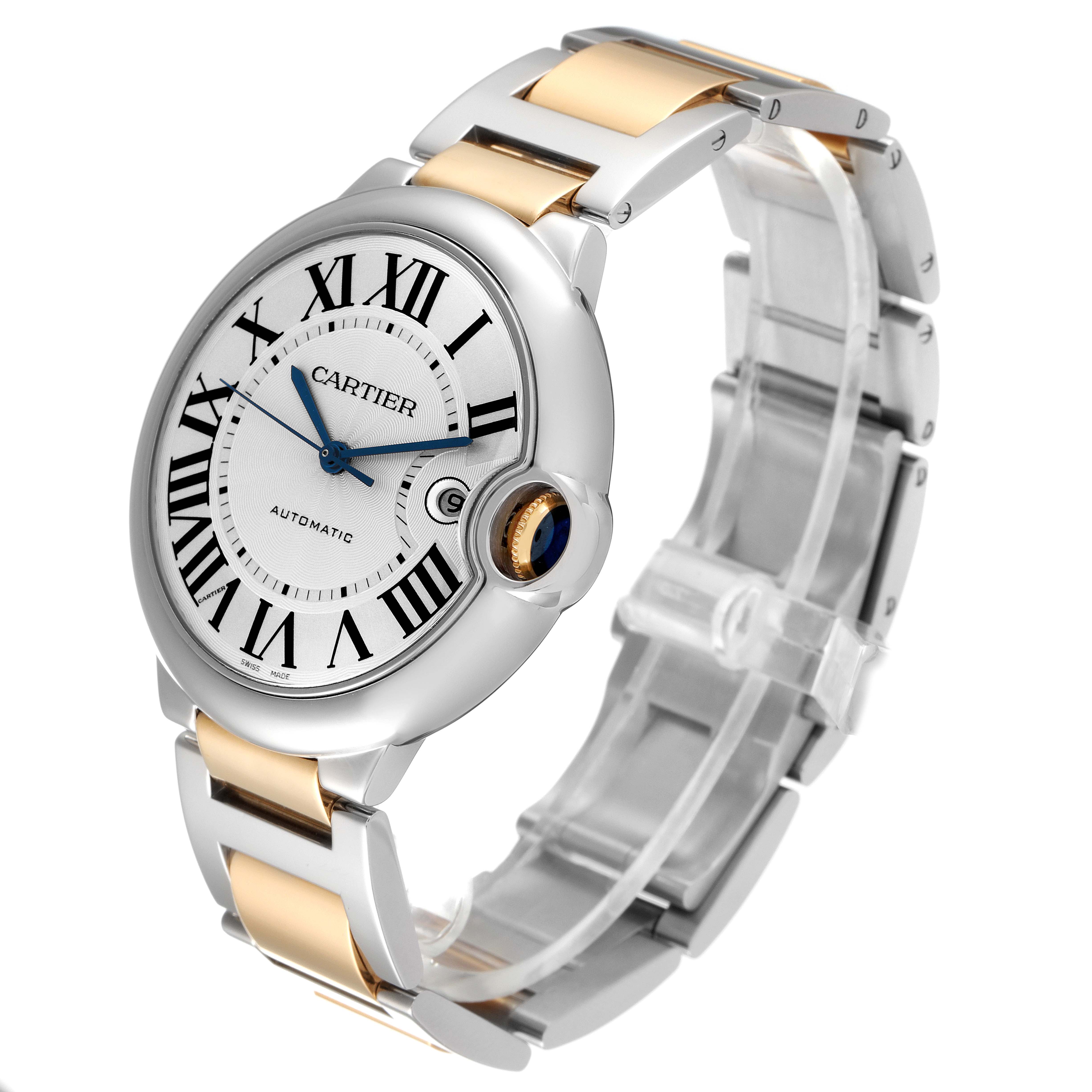 The Cartier Ballon Bleu W6900923 Men's Steel and Gold (two tone) Silver Dial W6900923 Men's Steel and Gold (two tone) Silver Dial watch is shown at a three-quarter angle, displaying its dial, bracelet, crown, and blue hands.