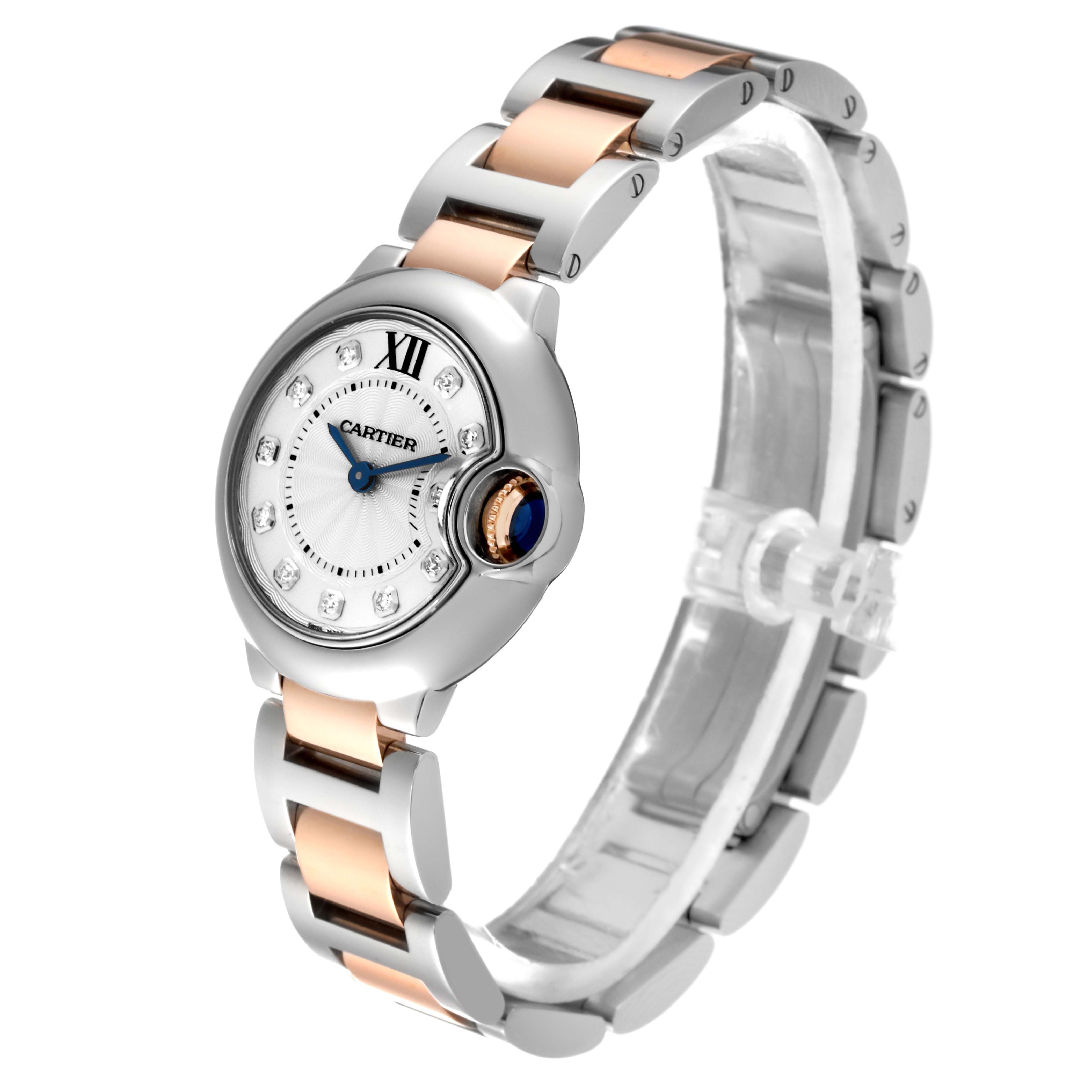 The image shows a Ballon Bleu de Cartier watch at a front-side angle, highlighting its bracelet and dial.