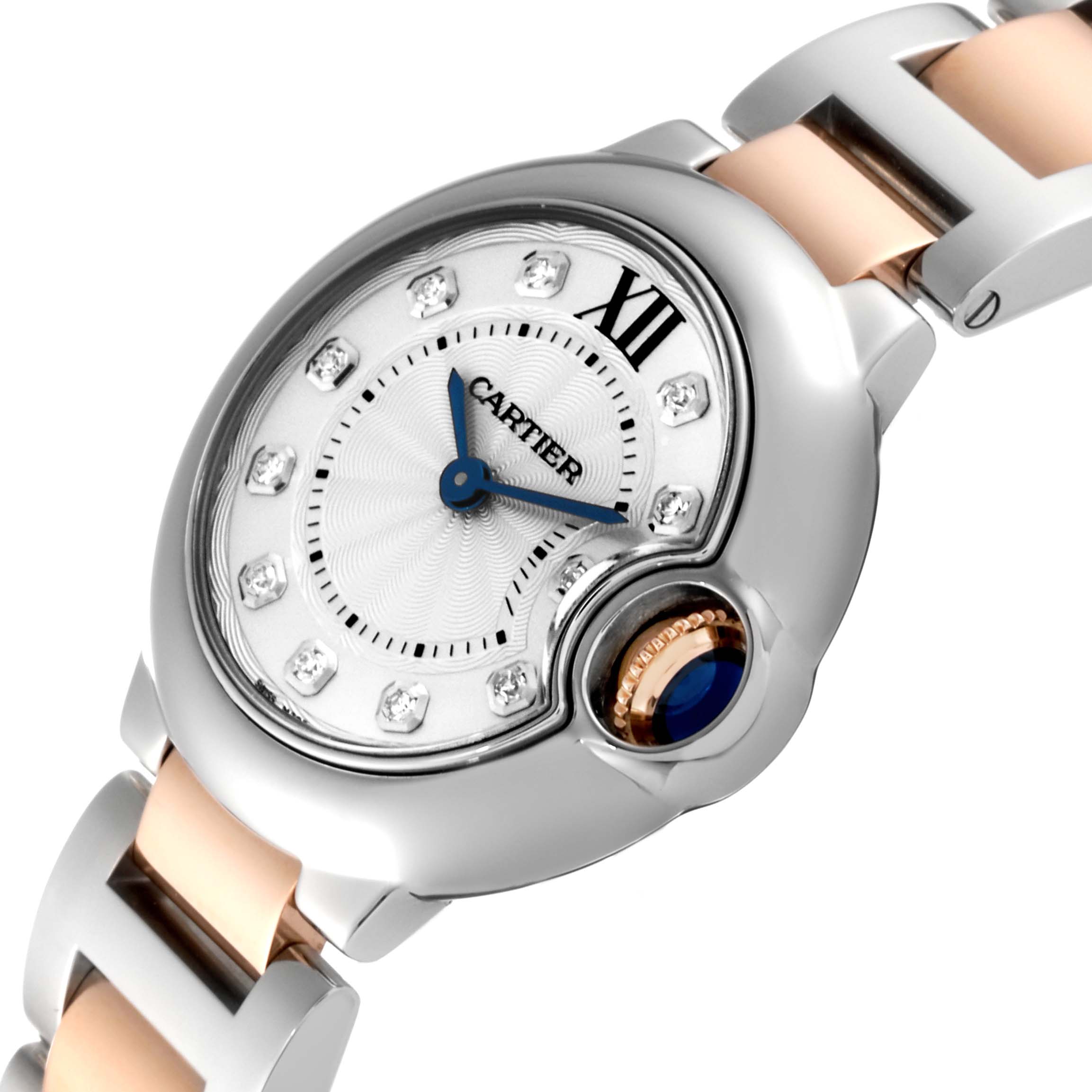 This image shows a close-up of the dial and part of the bracelet of a Cartier Ballon Bleu WE902030 Women's Steel and Gold (two tone) Silver Dial WE902030 Women's Steel and Gold (two tone) Silver Dial watch at a slightly angled perspective.