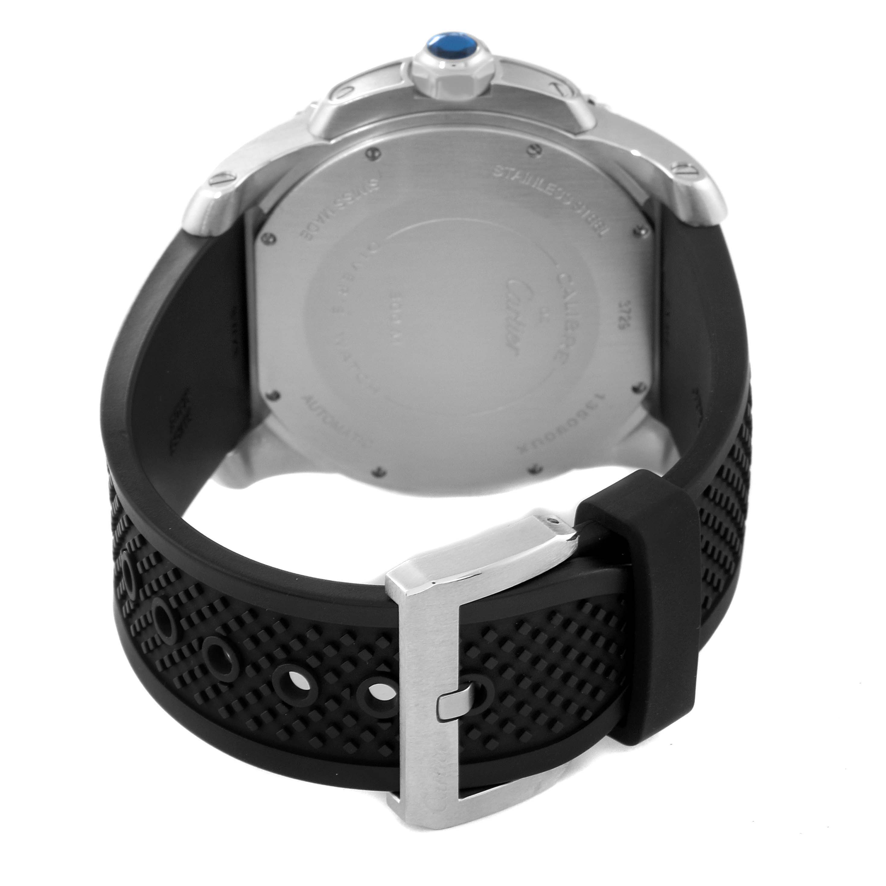 The image displays the back view of the Calibre de Cartier watch by Cartier, showcasing its case back, strap, and buckle.