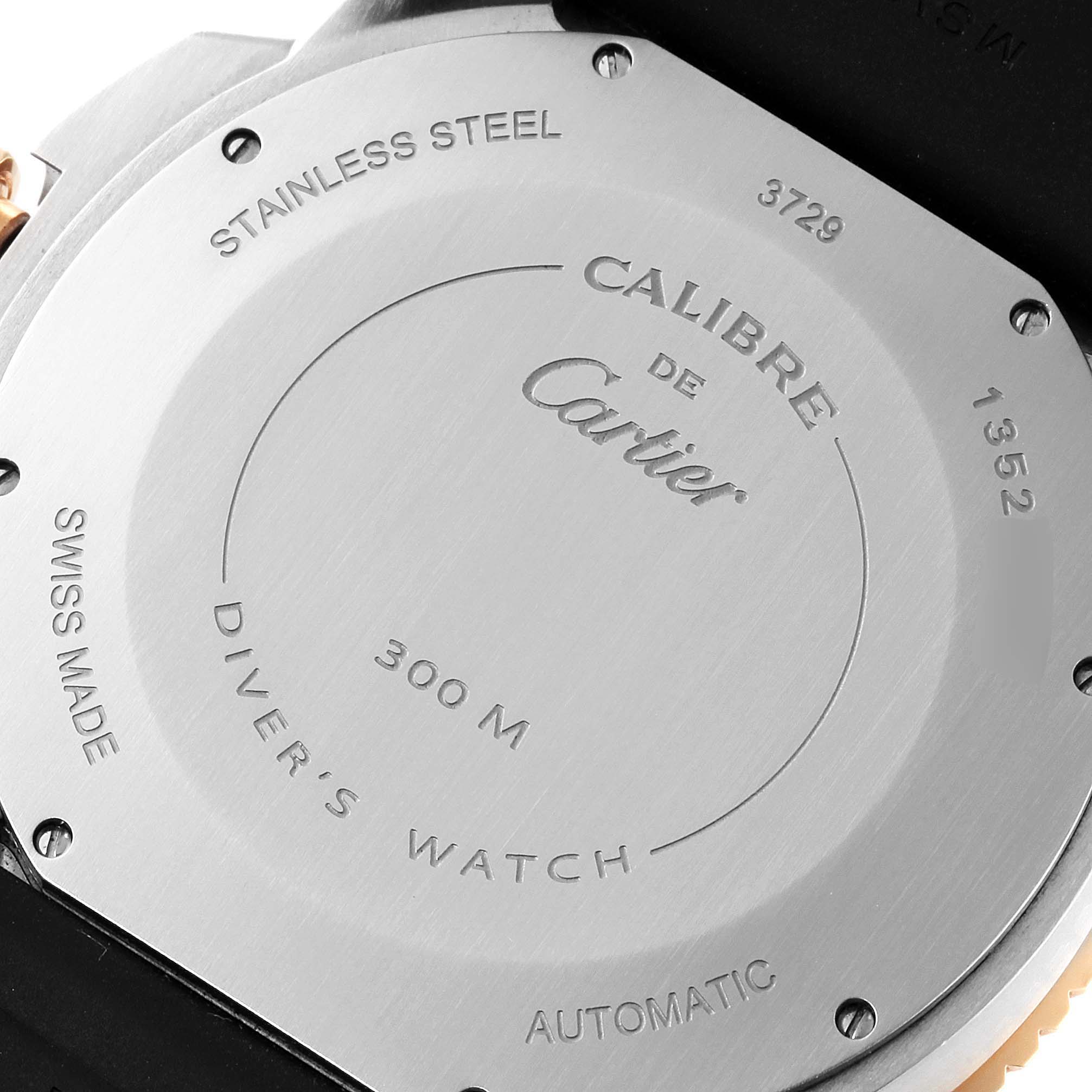 The image shows the stainless steel case back of a Calibre de Cartier Diver’s Watch by Cartier, viewed from the rear.