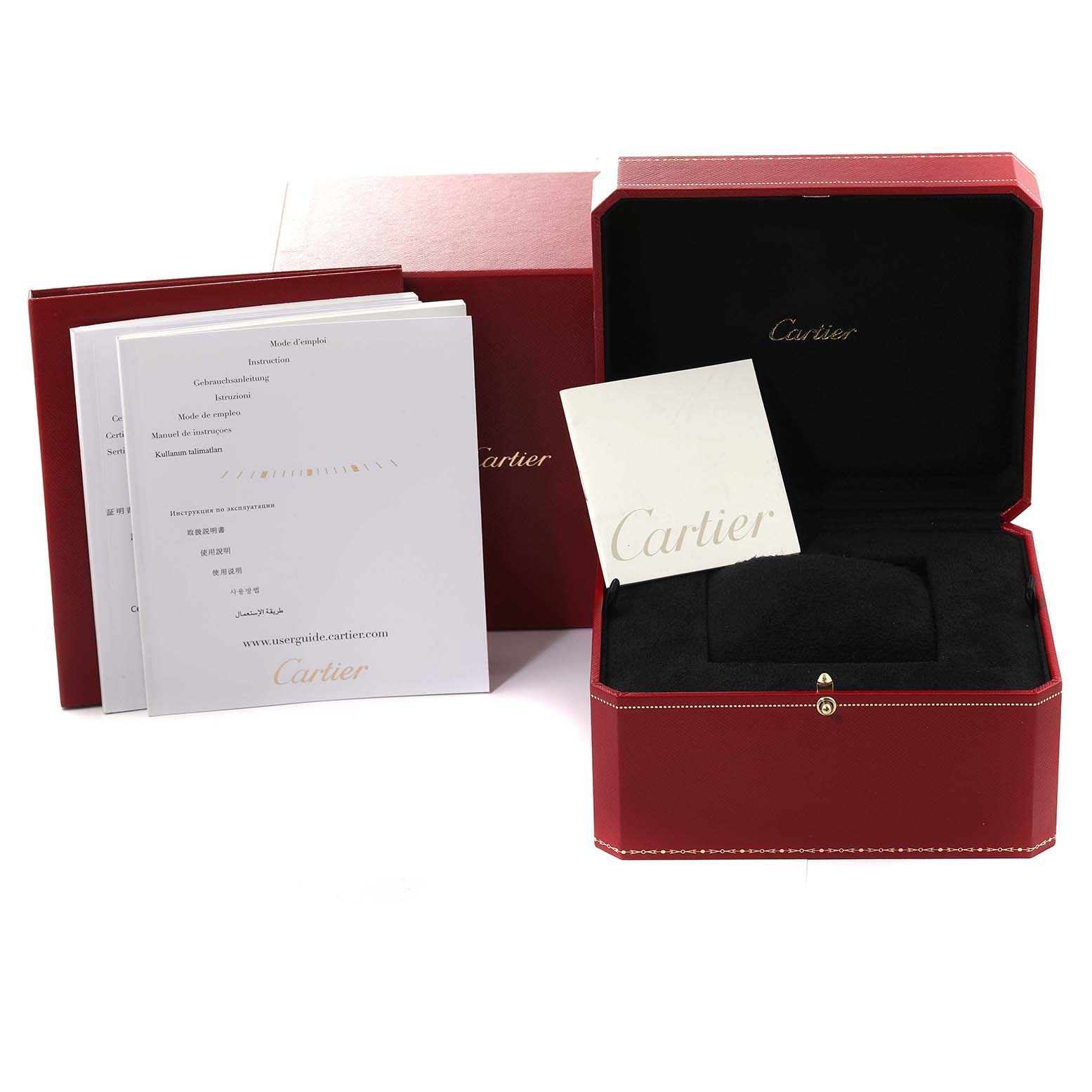 This image shows the packaging and documentation for a Cle model by Cartier, including the box, manuals, and booklet.