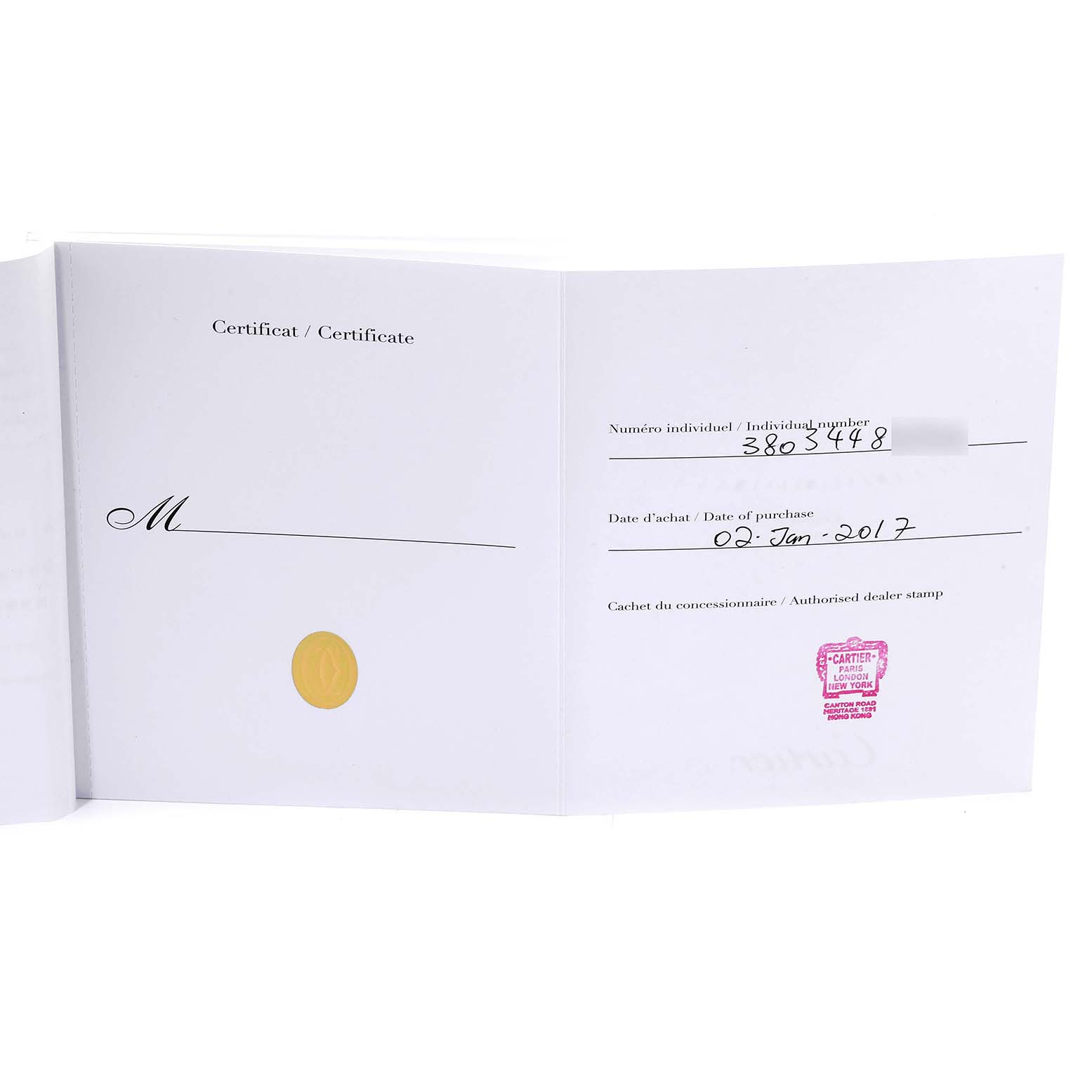 This image shows an open certificate booklet for a Cle model by Cartier, displaying purchase details and dealer stamp.