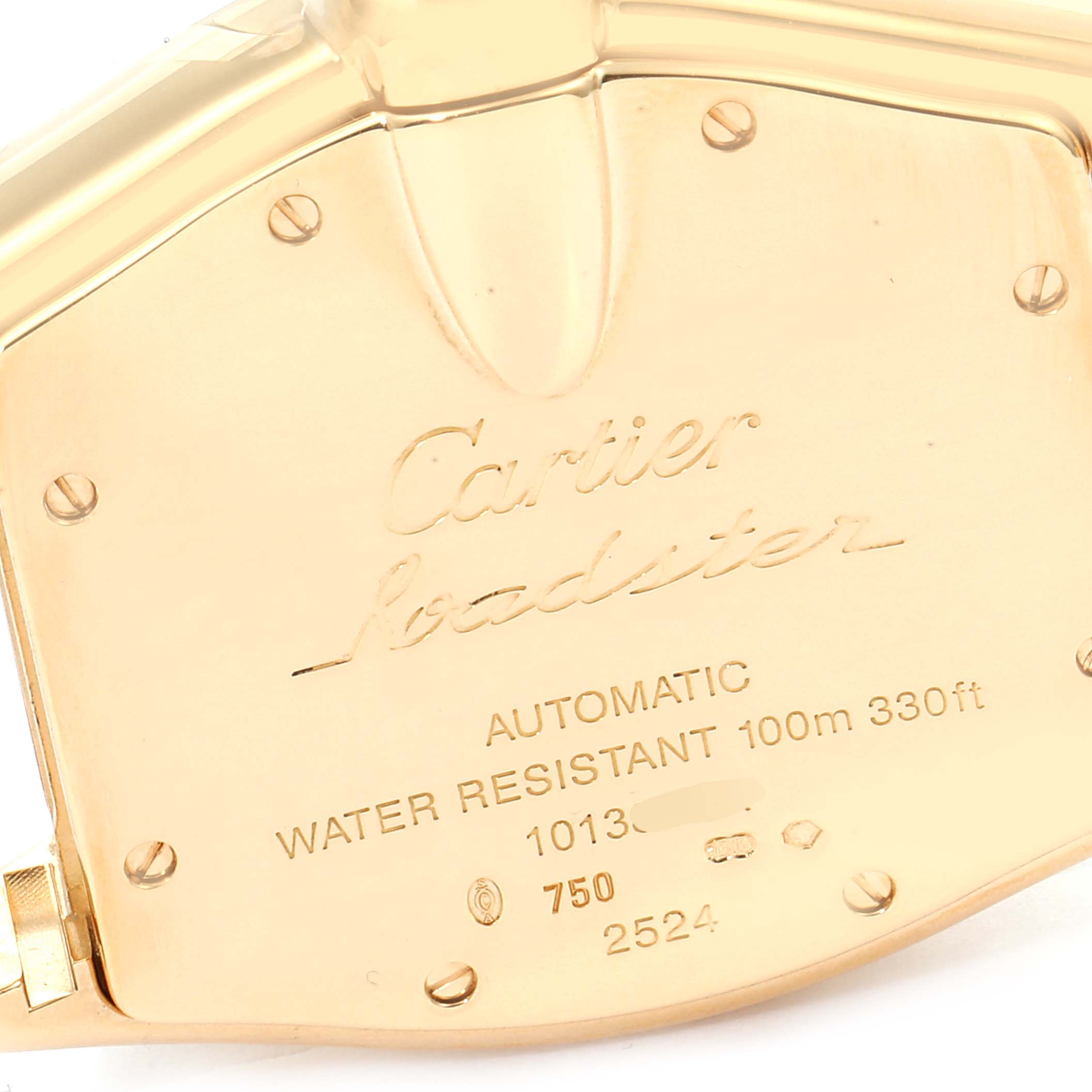 This image shows the back of a Cartier Roadster W62005V2 Men's Yellow Gold Silver Dial W62005V2 Men's Yellow Gold Silver Dial watch, highlighting the engraved details and screw heads.