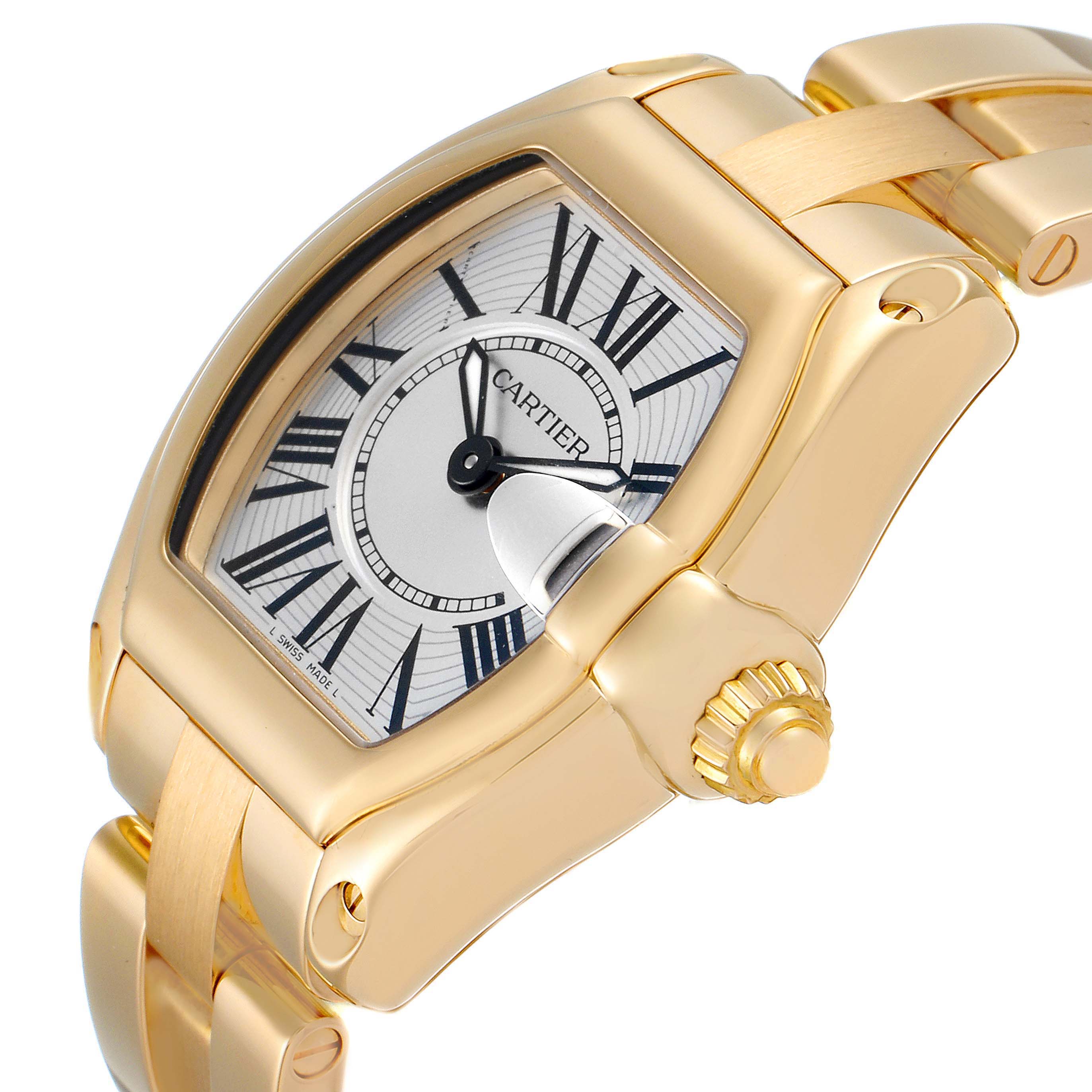 The image shows a close-up angled view of the Cartier Roadster W62018V1 Women's Yellow Gold Silver Dial W62018V1 Women's Yellow Gold Silver Dial watch, highlighting the face, crown, and part of the bracelet.