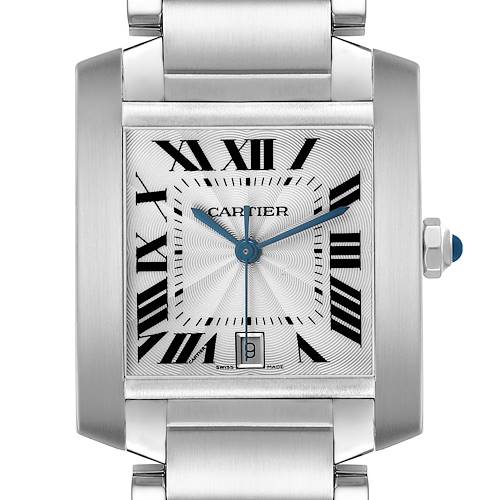 The Cartier Tank Française watch is shown from the front, highlighting the face, Roman numerals, hands, and crown with a blue gemstone.