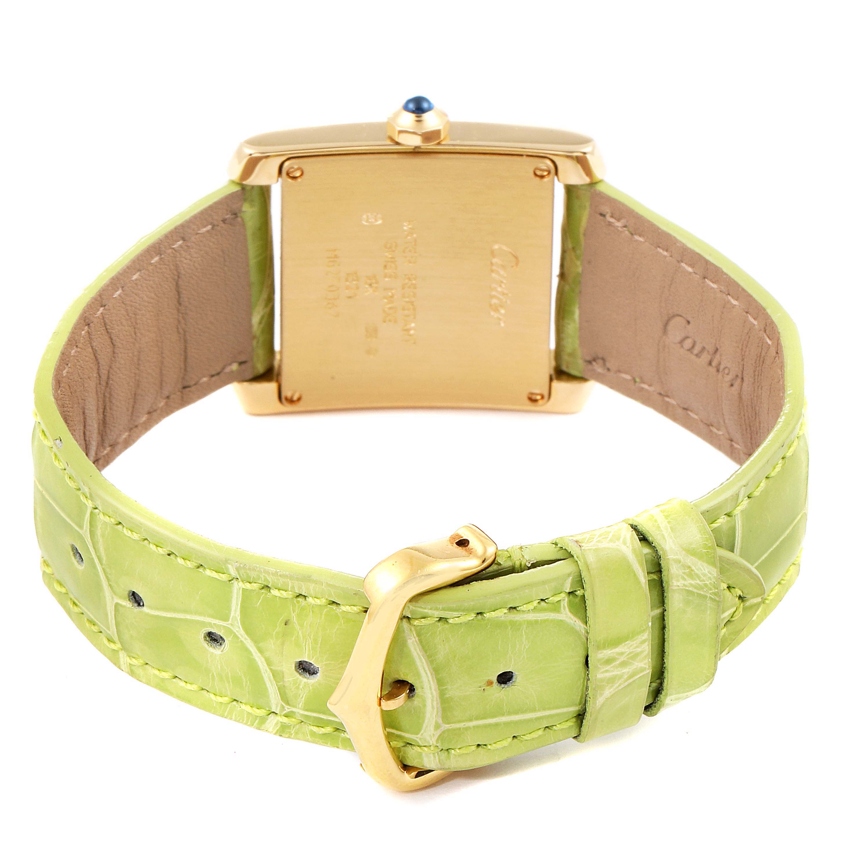 The image shows the back view of a Cartier Tank Française watch with a green leather strap and gold buckle.