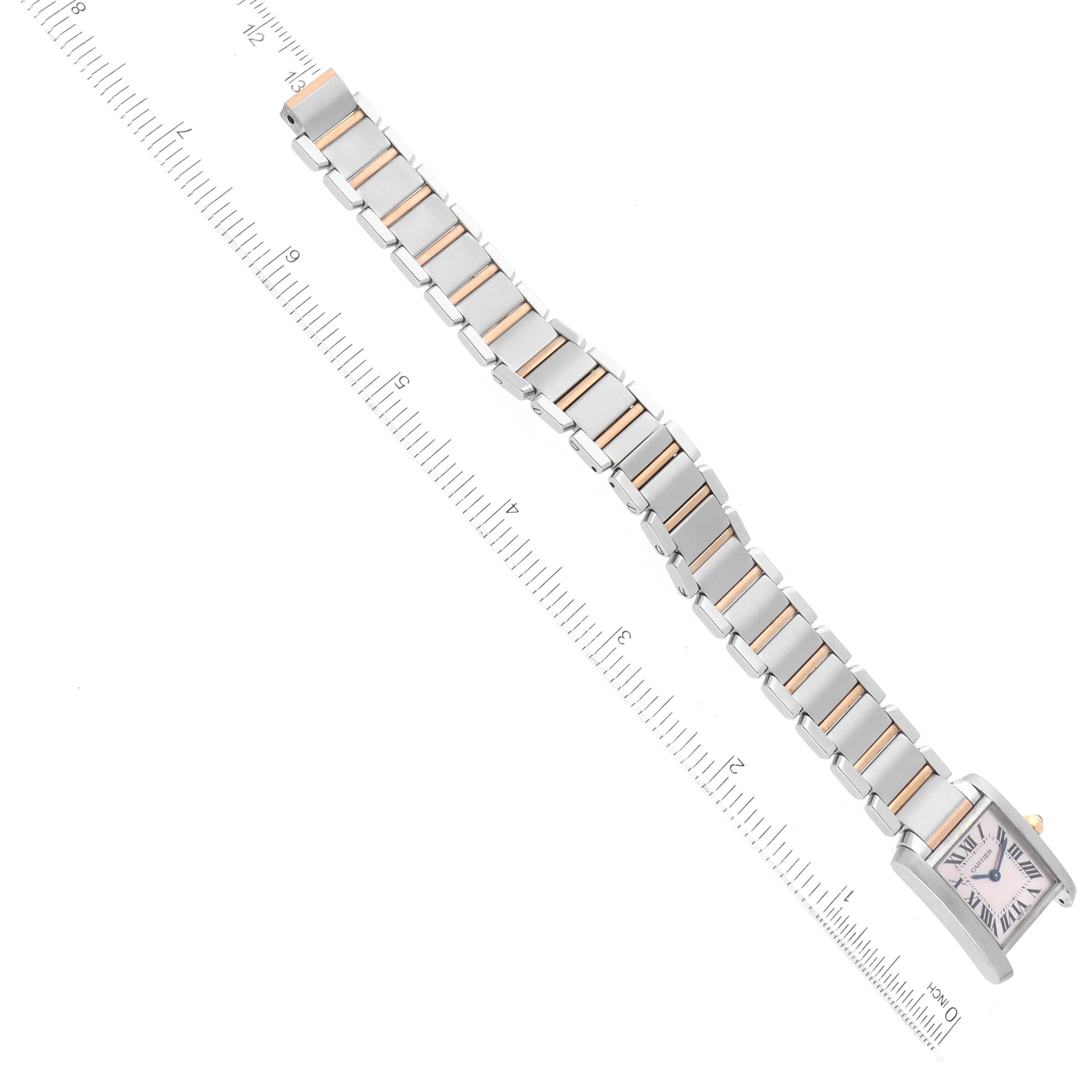 The image shows a flat-lay view of a Cartier Tank Francaise W51027Q4 Women's Stainless Steel Mother of Pearl Dial W51027Q4 Women's Stainless Steel Mother of Pearl Dial watch with a two-tone metal bracelet and rectangular case.
