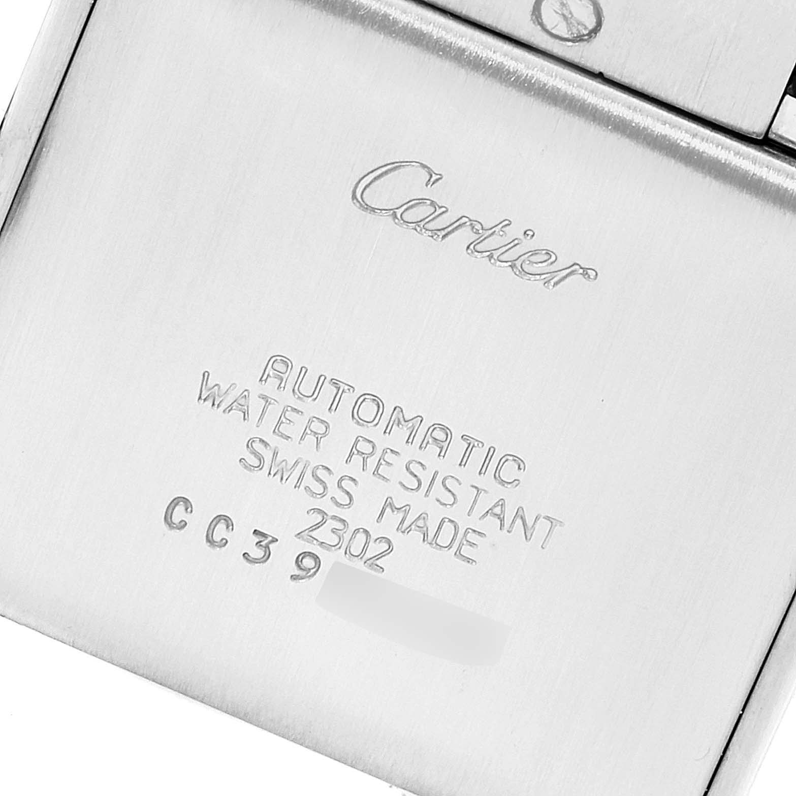This image shows the case back of a Cartier Tank Française watch, seen from a close-up angle.