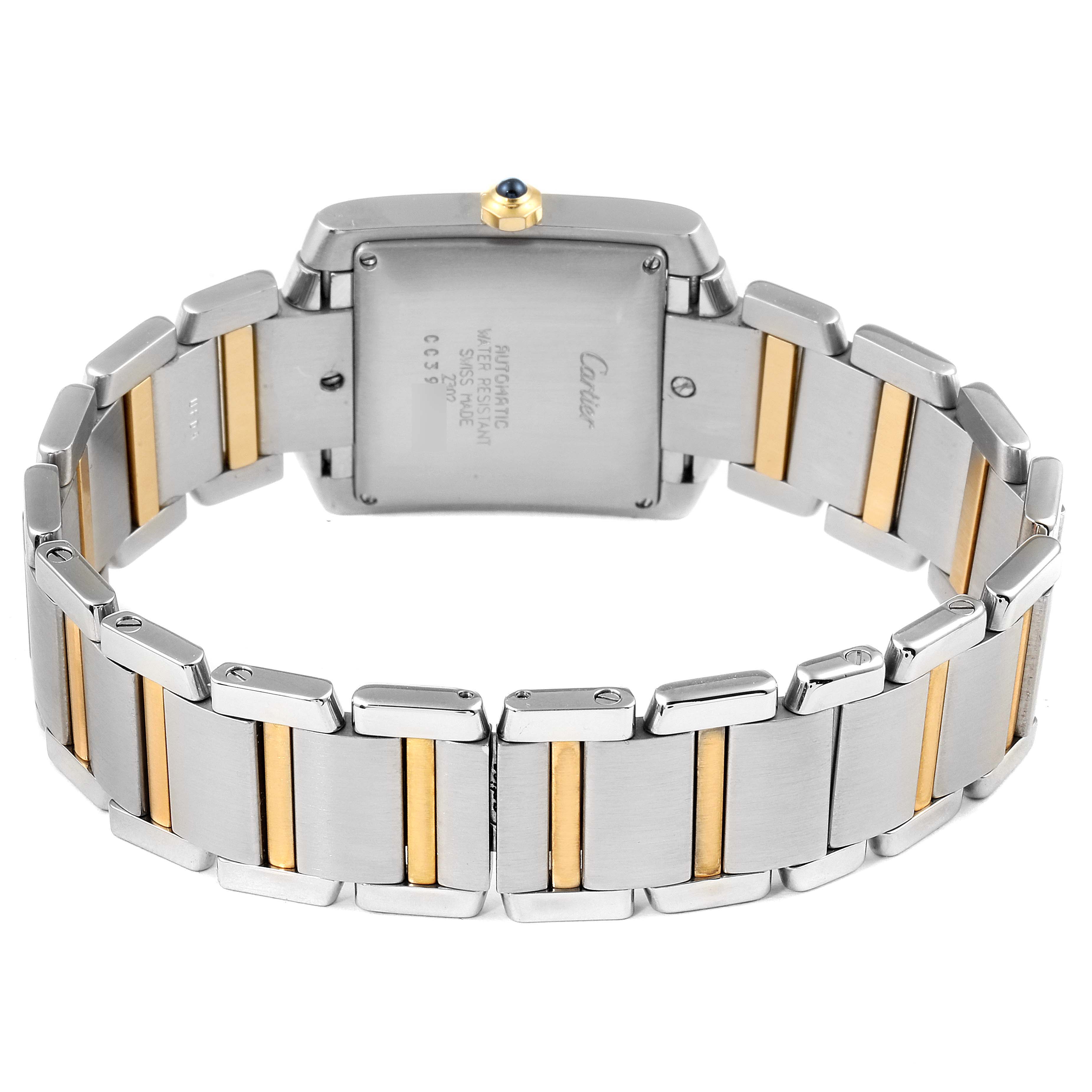 The image shows the back of a Cartier Tank Francaise W51005Q4 Men's Steel and Gold (two tone) Silver Dial W51005Q4 Men's Steel and Gold (two tone) Silver Dial watch, focusing on the case back and two-tone metal bracelet.
