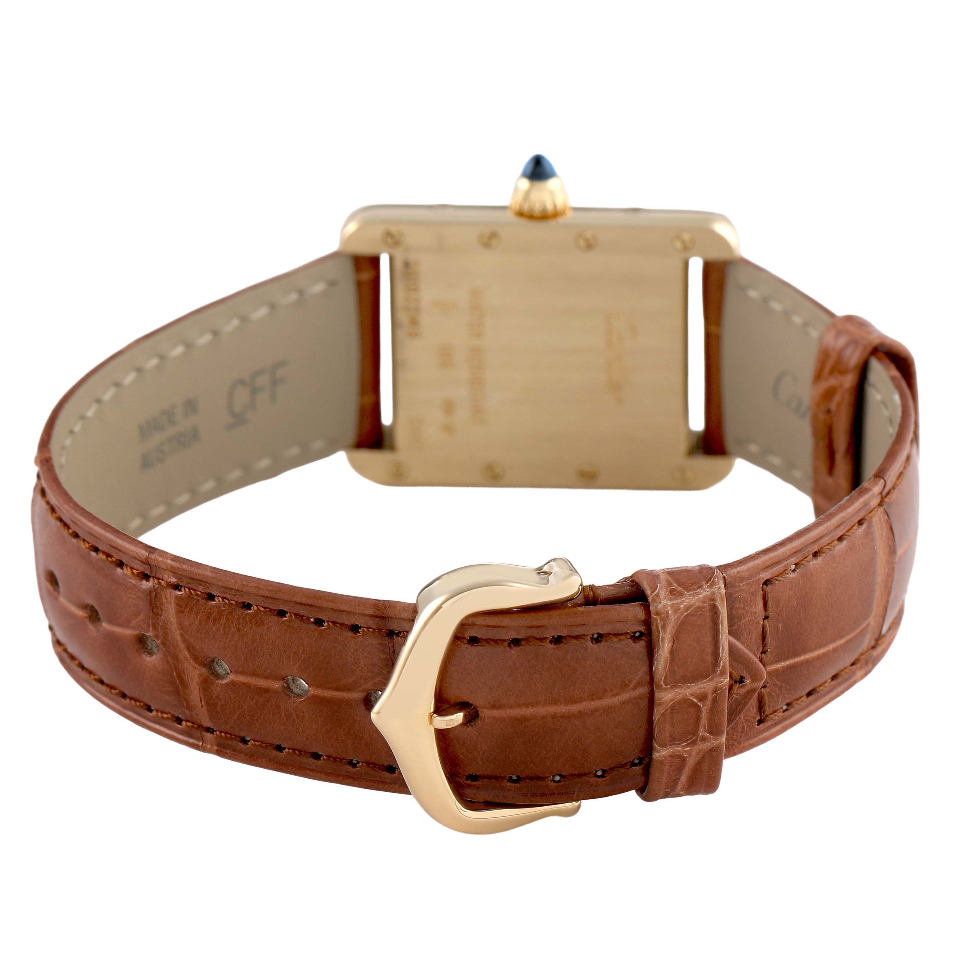 The image shows the back view of the Cartier Tank Louis W1529856 Women's Yellow Gold Silver Dial watch, highlighting the clasp and brown leather strap.