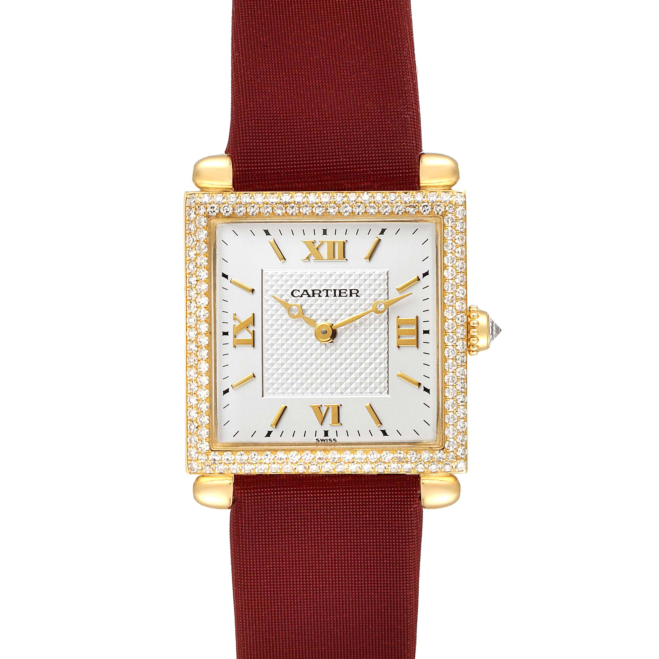 The image shows the Tank Obus model by Cartier from a front view, showcasing its square dial, gold case, and red strap.