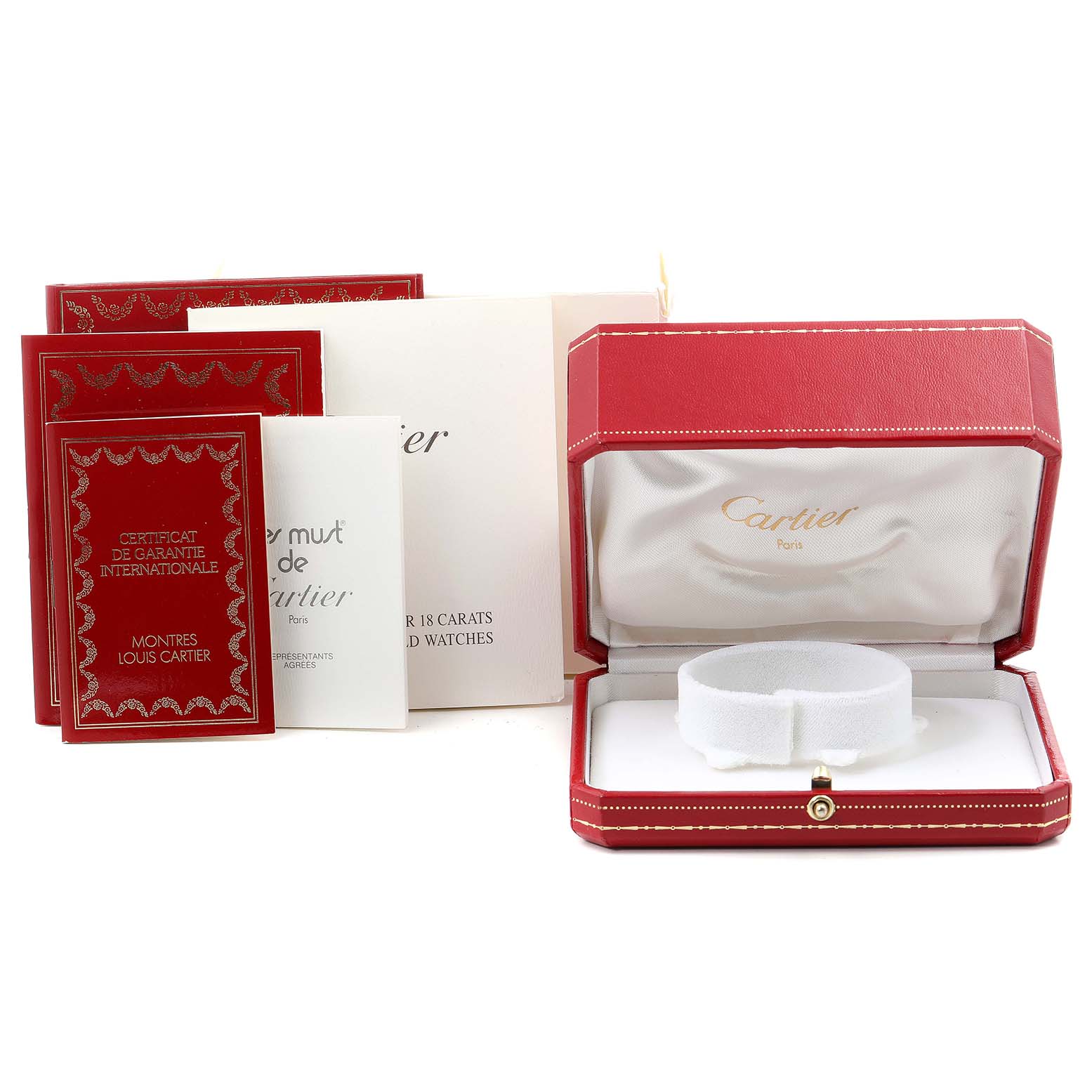The image features the packaging and documentation for the Cartier Tank Obus WB800351  Women's Yellow Gold Silver Dial WB800351  Women's Yellow Gold Silver Dial watch, including its red case and guarantee certificates.