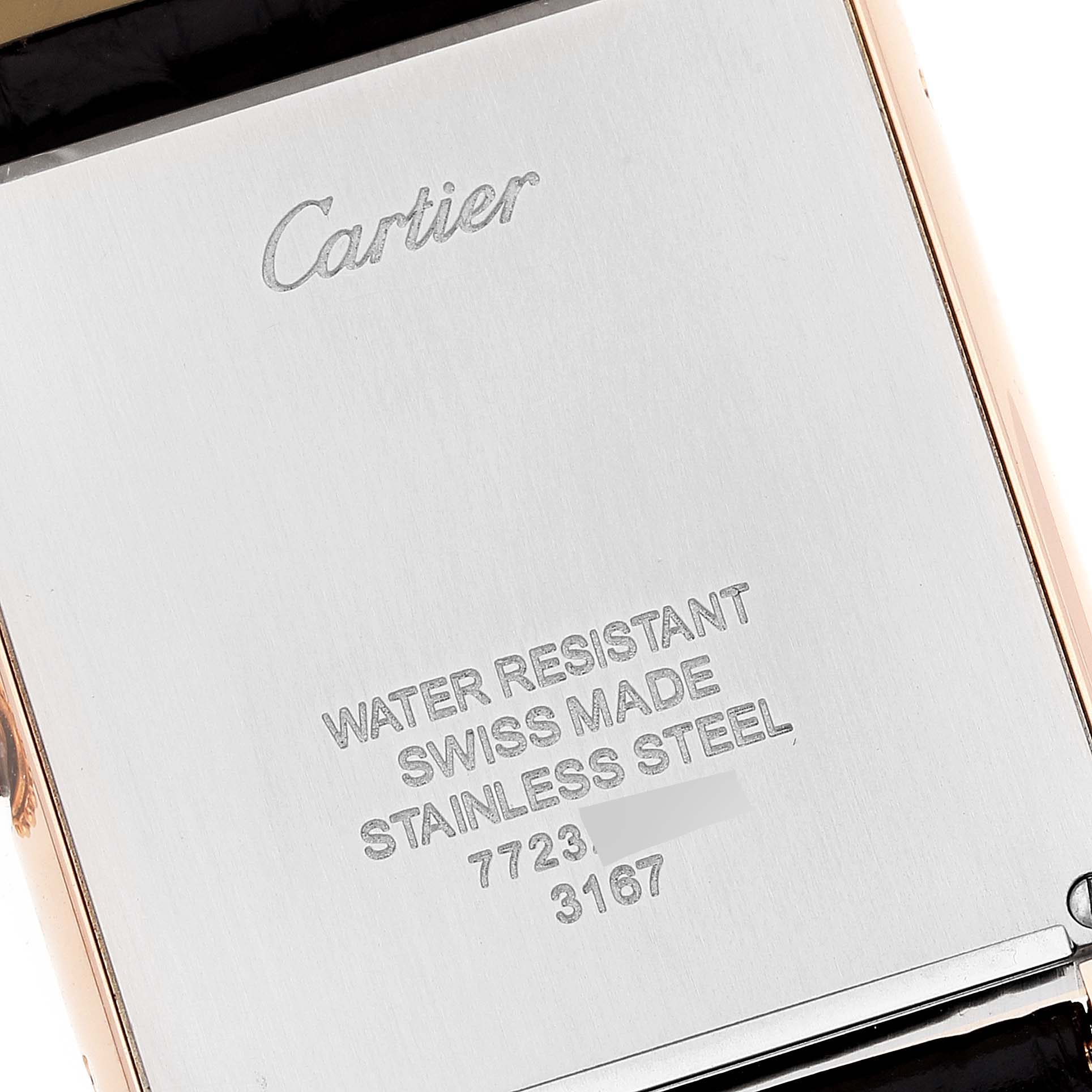 The image shows the back case of the Cartier Tank Solo W5200025 Men
s Rose Gold Silver Dial W5200025 Men
s Rose Gold Silver Dial watch engraved with brand and model details.