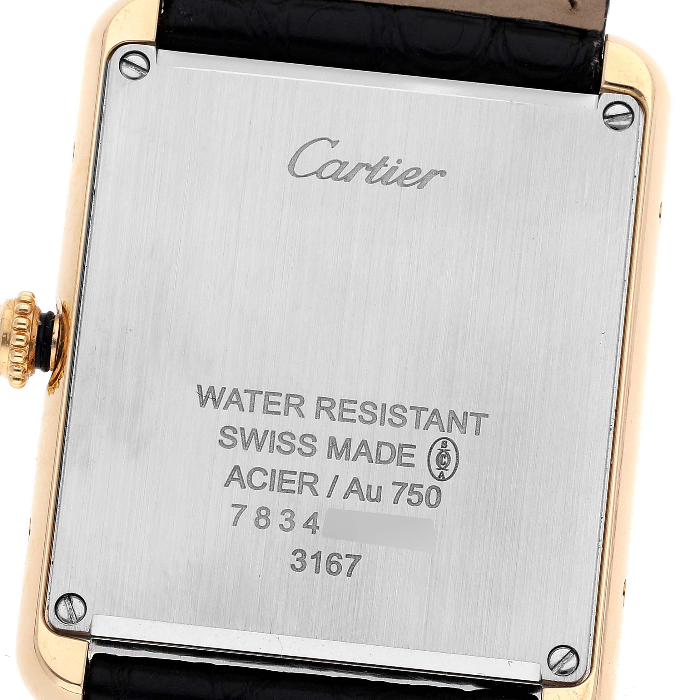 The image shows the back of a Cartier Tank Solo W5200004 Men
s Yellow Gold Silver Dial W5200004 Men
s Yellow Gold Silver Dial watch, highlighting the brand name, water resistance, and material details.