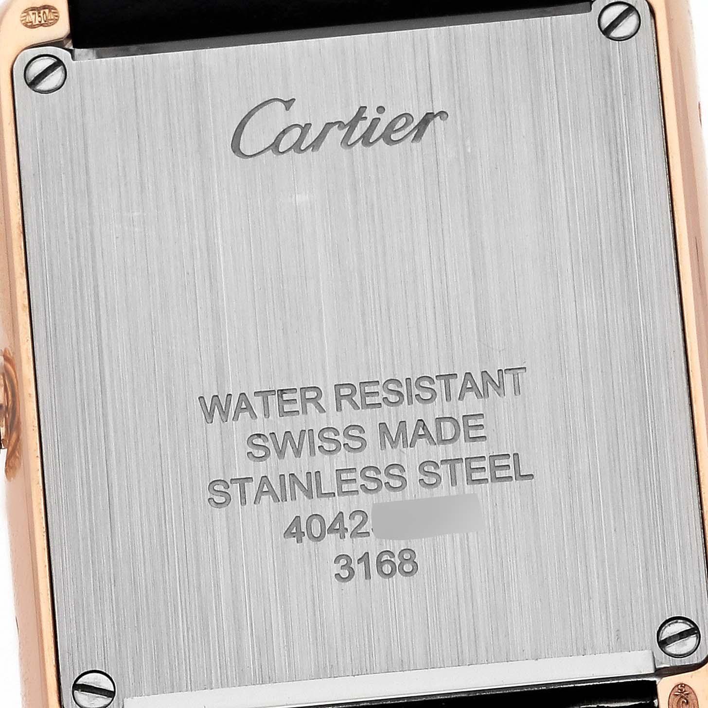 The image shows the back case of a Cartier Tank Solo W5200024 Women's Rose Gold Silver Dial W5200024 Women's Rose Gold Silver Dial watch, highlighting its water resistance, Swiss-made stainless steel, and model information.