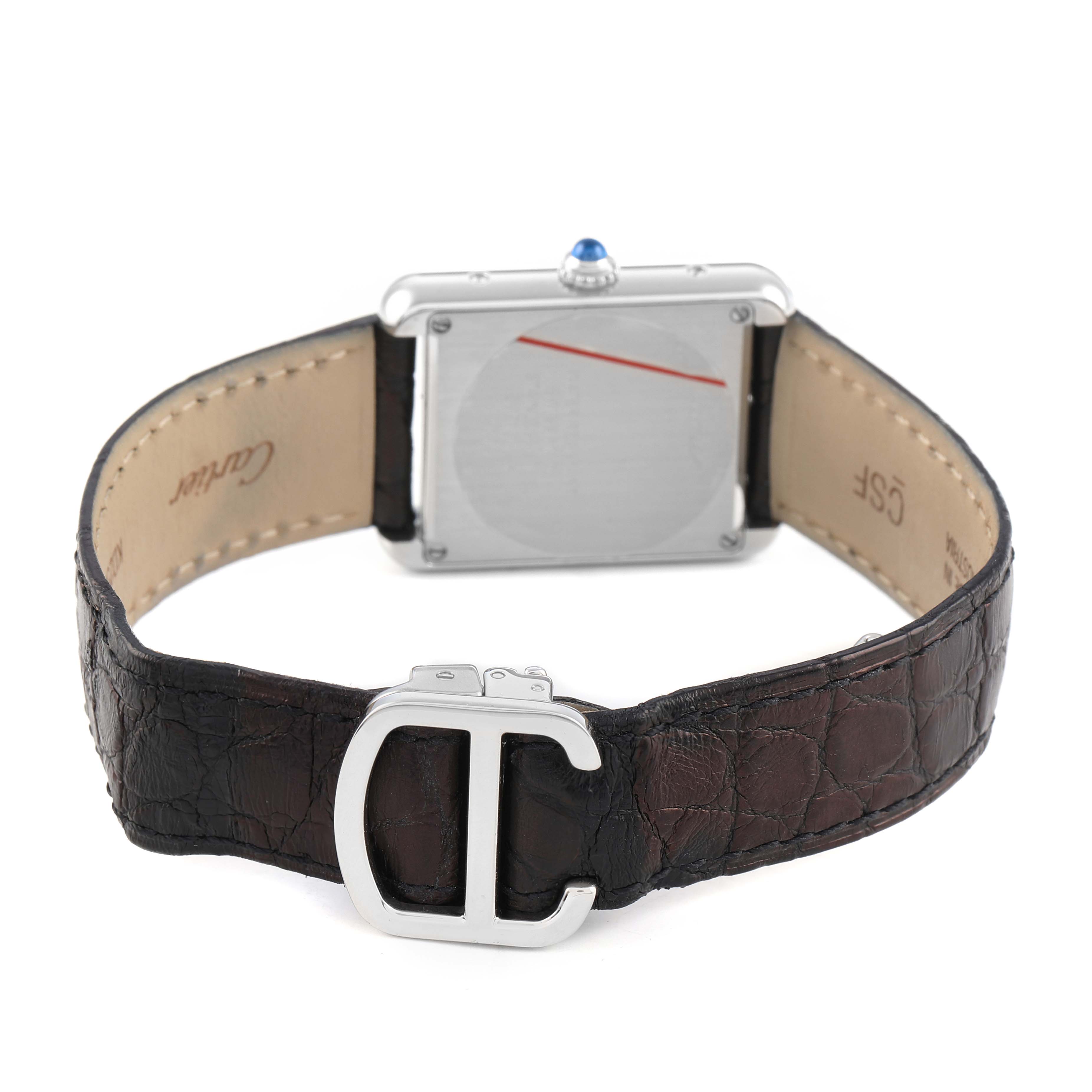 The image shows the back view of the Cartier Tank Solo W5200005 Women's Stainless Steel Silver Dial watch, highlighting the leather strap and clasp.