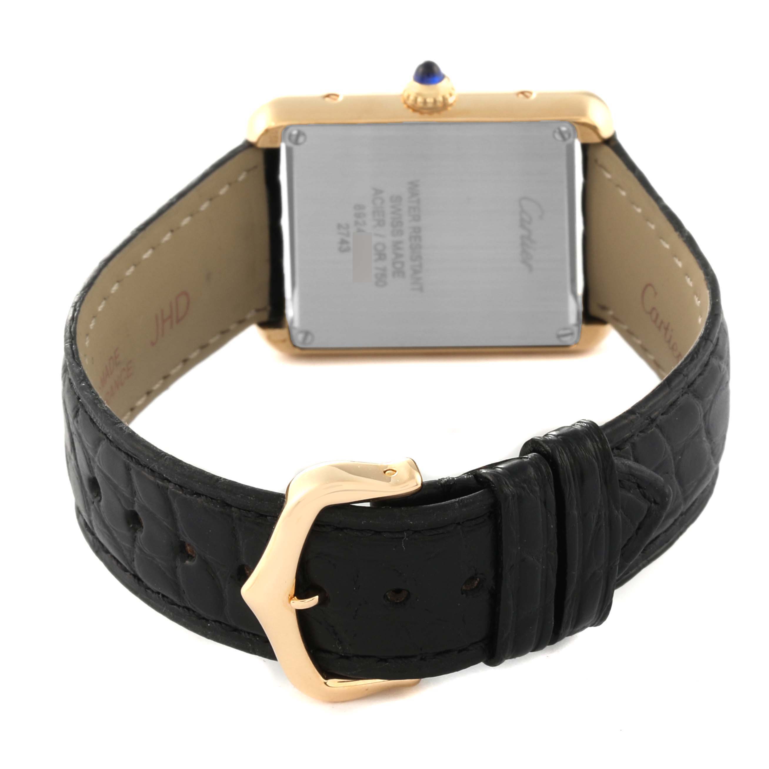 This image shows the back view of the Cartier Tank Solo W1018755 Women
s Steel and Gold (two tone) Silver Dial W1018755 Women
s Steel and Gold (two tone) Silver Dial watch, including the case back and black leather strap with a gold buckle.