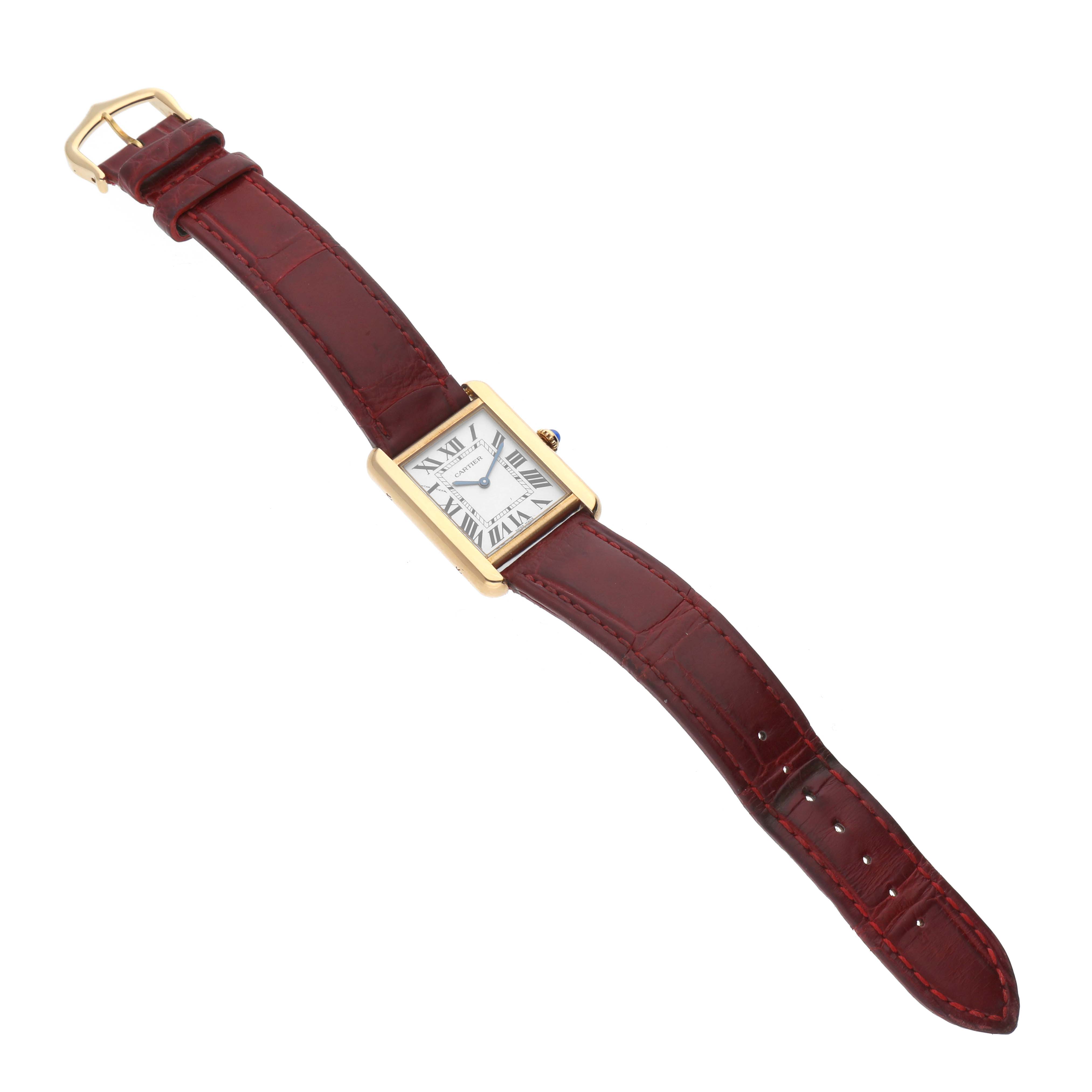 The image shows a Cartier Tank Solo W5200002 Women's Steel and Gold (two tone) Silver Dial W5200002 Women's Steel and Gold (two tone) Silver Dial watch with a brown leather strap, displayed at an angled top-down view.