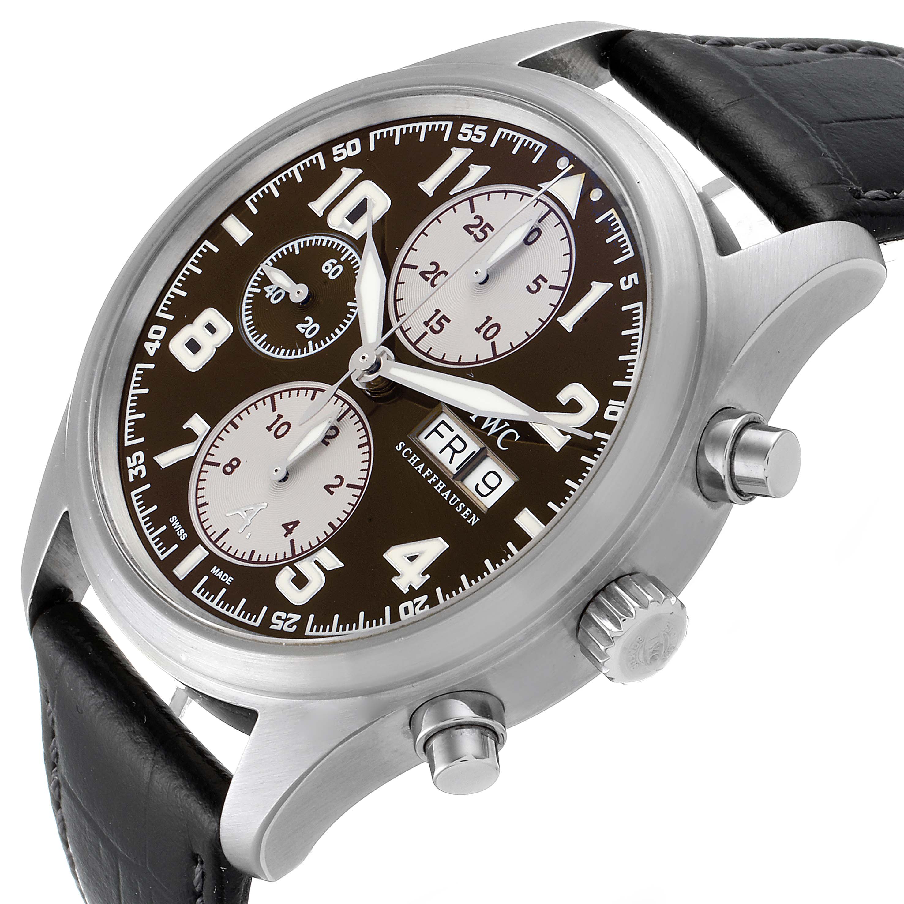 This image shows an angled view of the IWC Pilot IW371709 Men's Stainless Steel Brown Dial IW371709 Men's Stainless Steel Brown Dial model watch, highlighting its dial, bezel, crown, pushers, and leather strap.