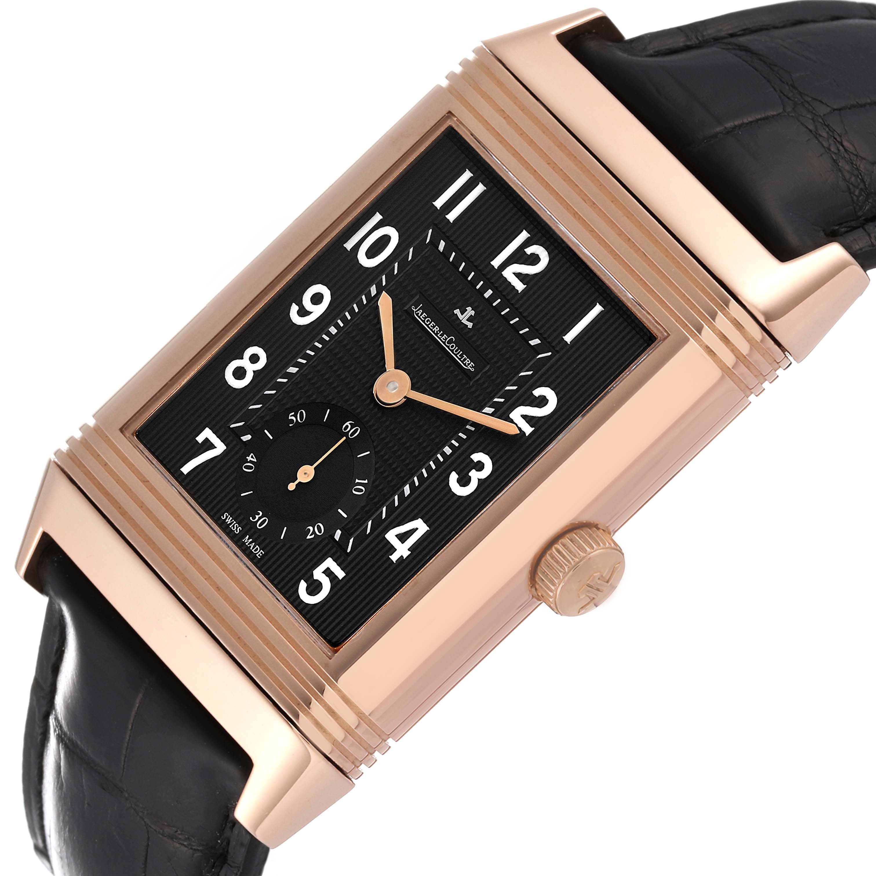The image shows a close-up angle of the Jaeger LeCoultre Reverso Q3732470 Men's Rose Gold Black Dial Q3732470 Men's Rose Gold Black Dial watch, highlighting its black dial, gold case, and leather strap.