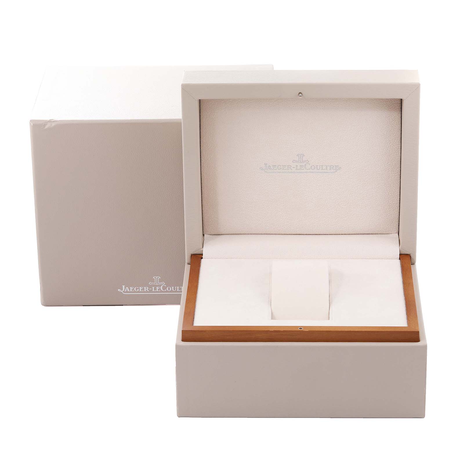 The image shows the open packaging box for a Jaeger-LeCoultre Reverso watch.