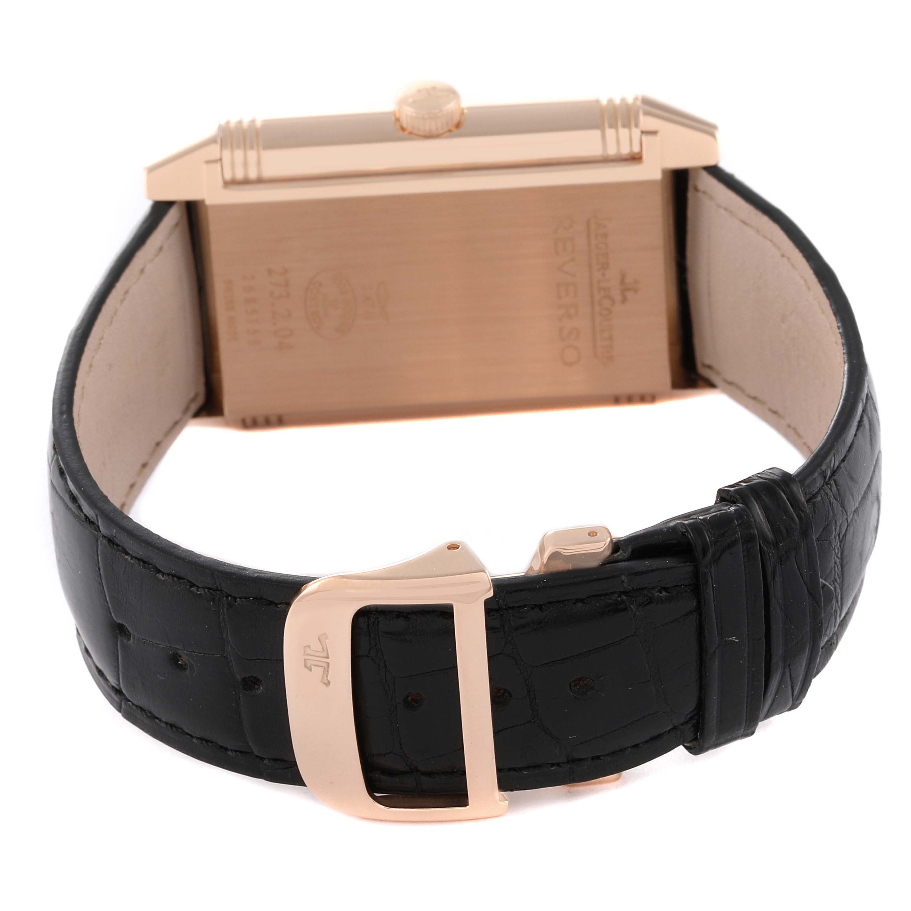 This image shows the back view of a Jaeger LeCoultre Reverso Q3732470 Men's Rose Gold Black Dial Q3732470 Men's Rose Gold Black Dial watch, highlighting its case, crown, leather strap, and buckle.