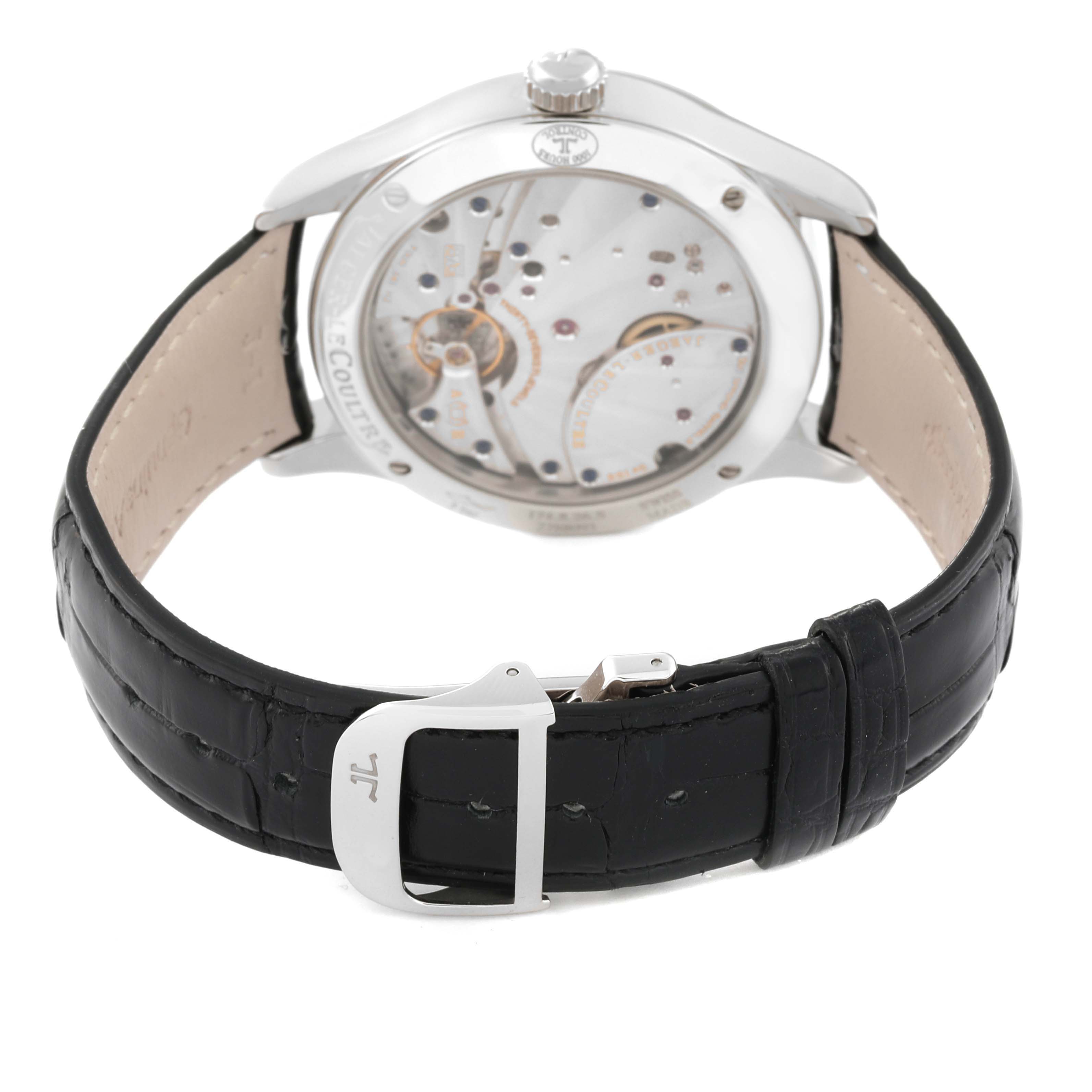 The image displays the back view of a Jaeger-LeCoultre Master model watch, highlighting the case back and black leather strap with clasp.