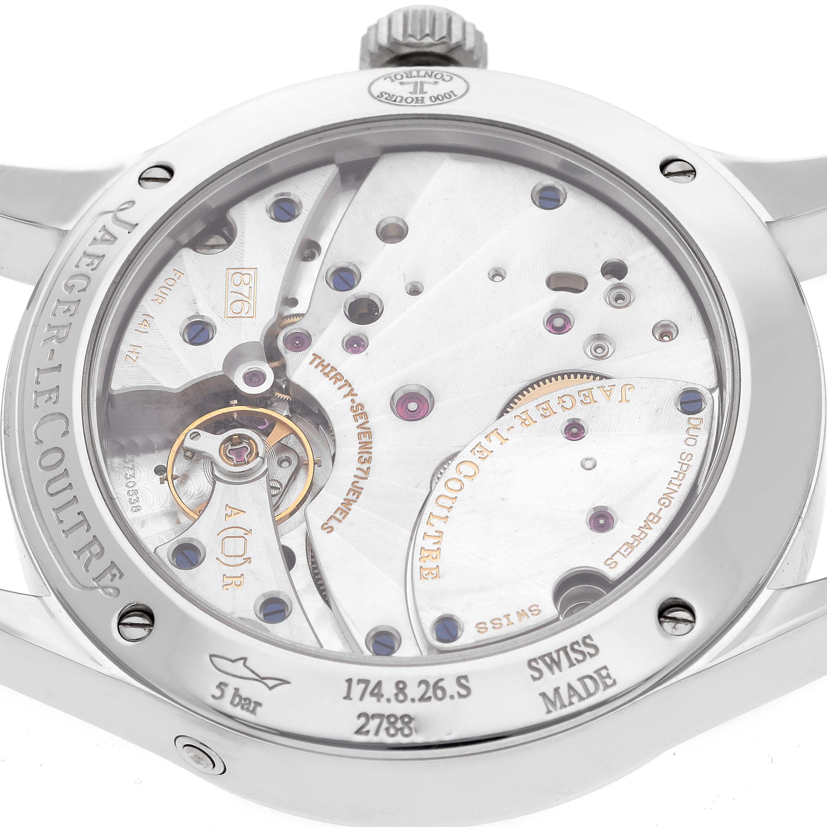 The image shows the rear view of a Jaeger-LeCoultre Master model watch revealing the intricate mechanical movement.